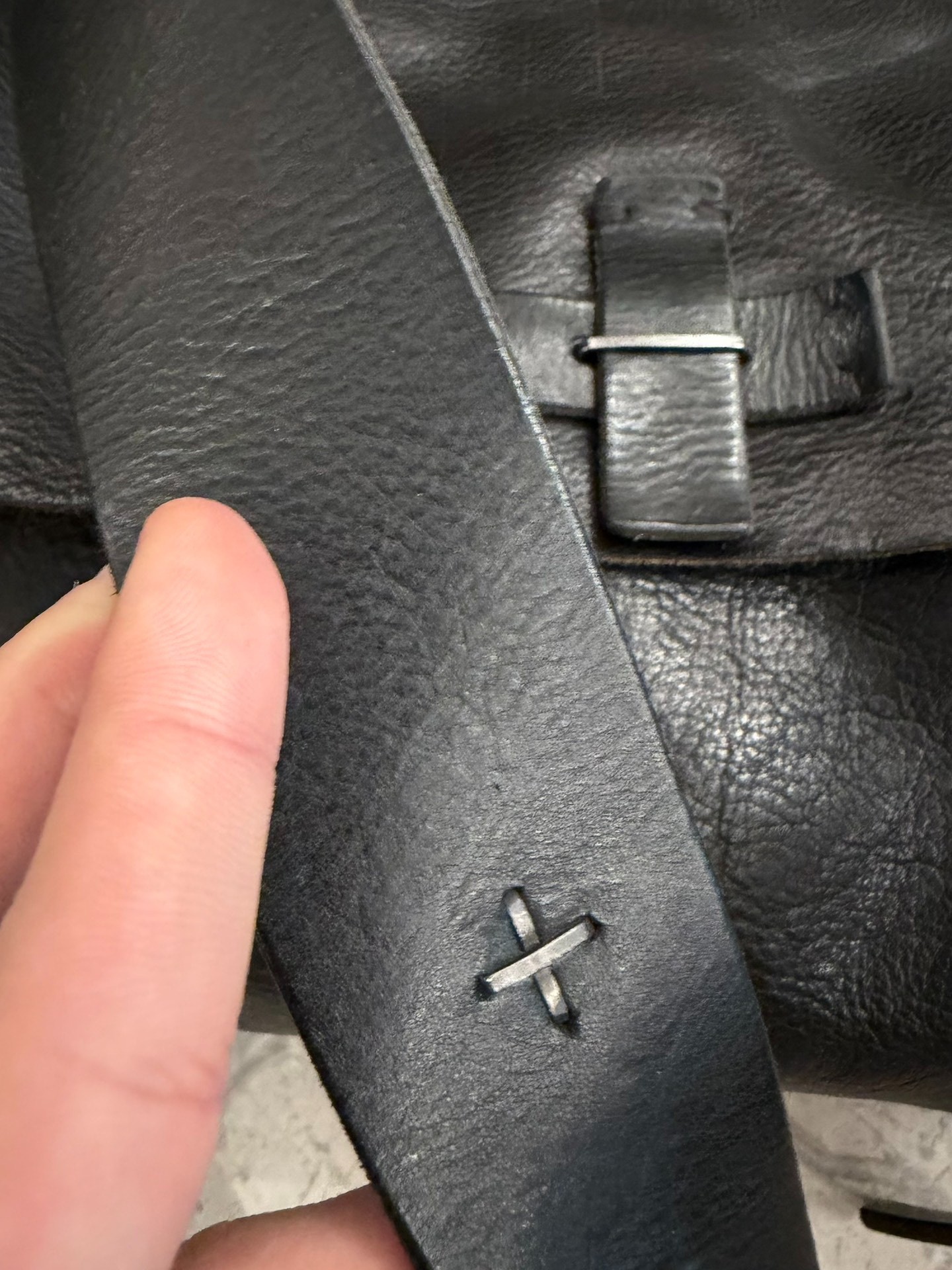 MA+ Black Leather Accordion Crossbody — label