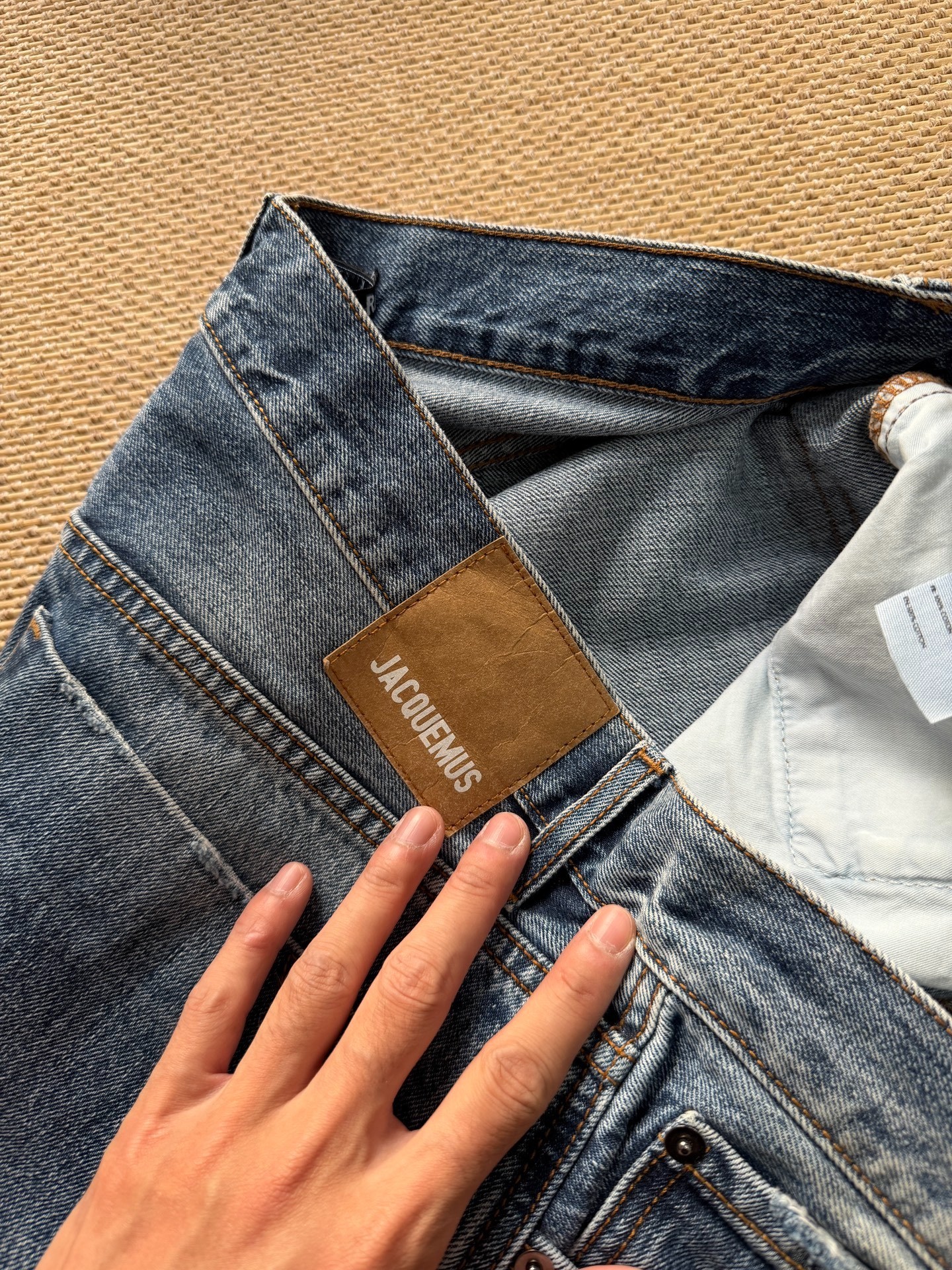 Jacquemus Faded Indigo Wide-Leg Jeans — detail