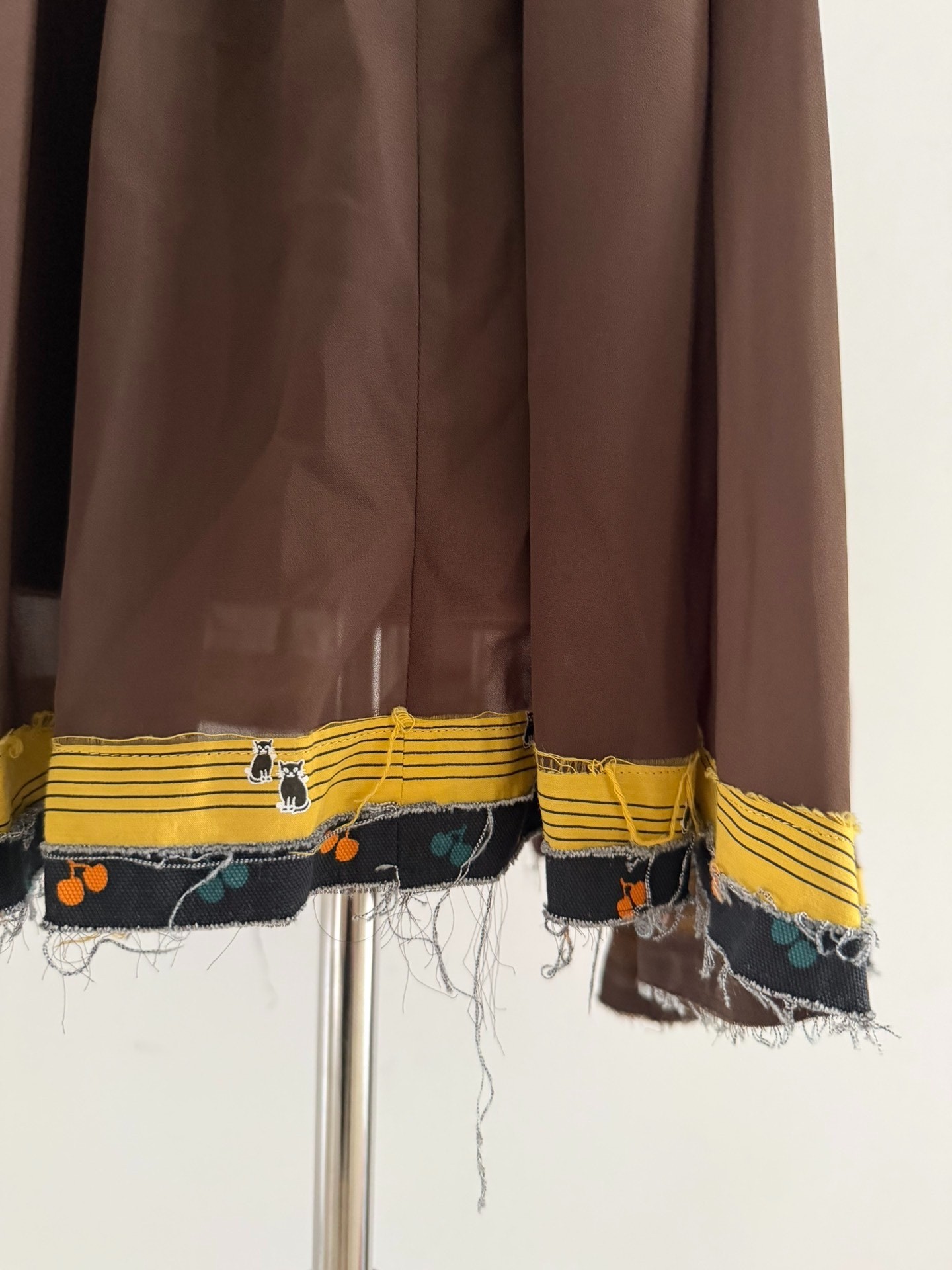 Undercover Early Layered Pattern Skirt — back