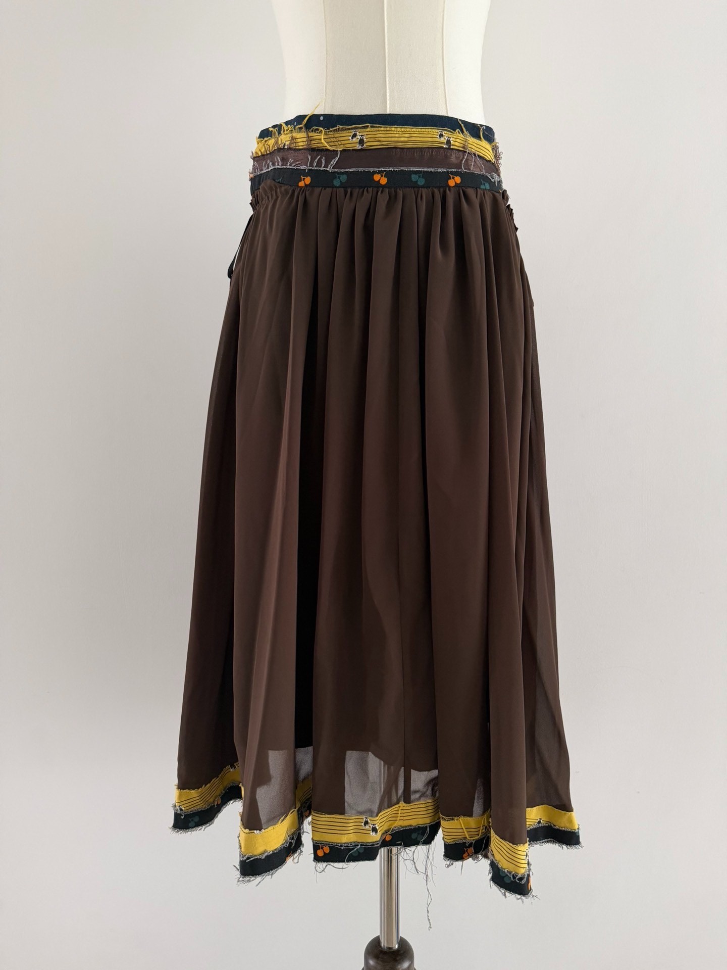 Undercover Early Layered Pattern Skirt — detail