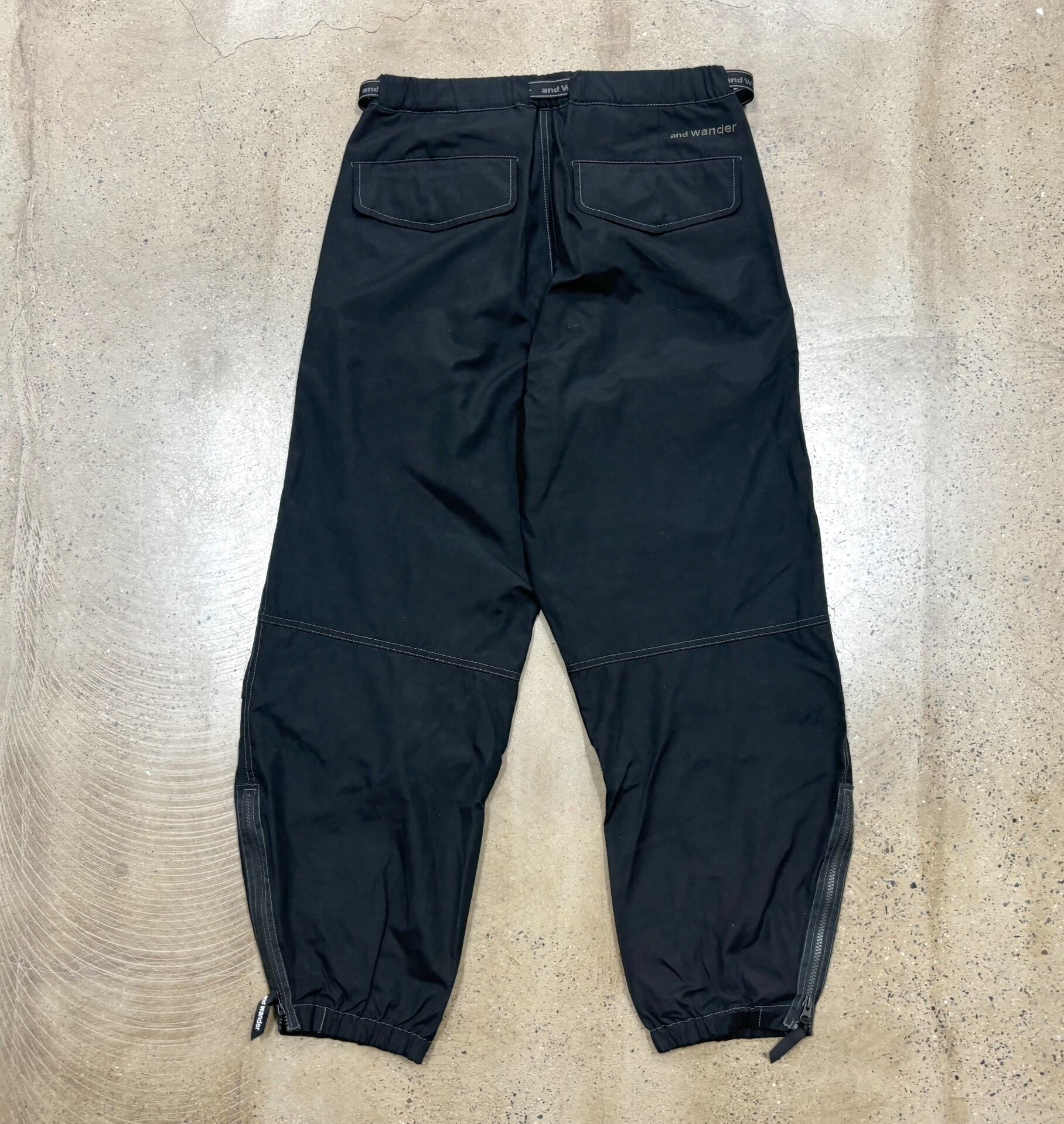 and Wander 24AW Parachute Cargo Pants — front
