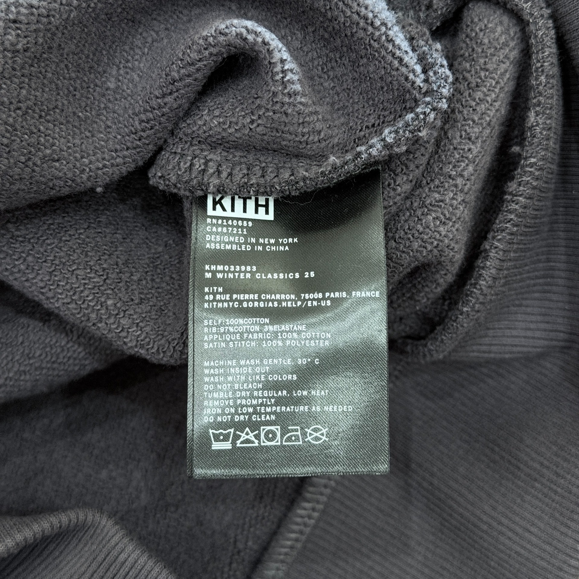 Kith Nelson 25 Color-Blocked Polo Sweatshirt — label