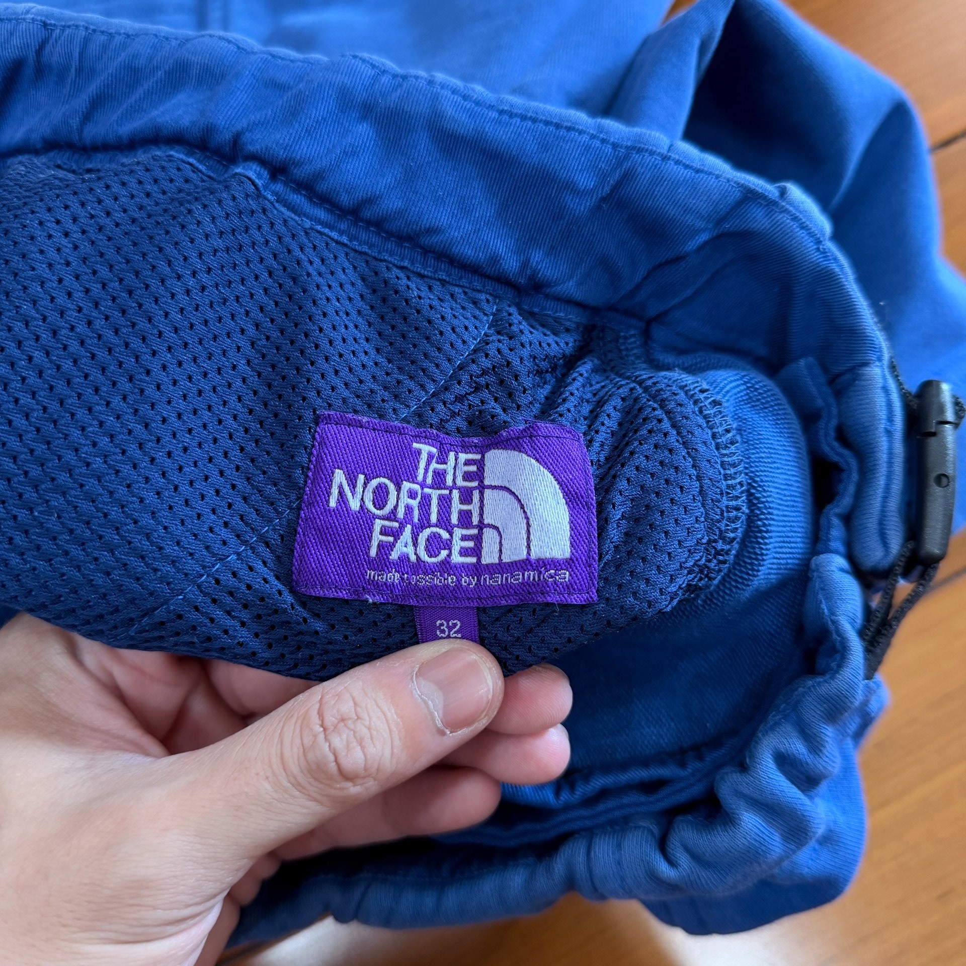 The North Face Blue Cargo Shorts — label