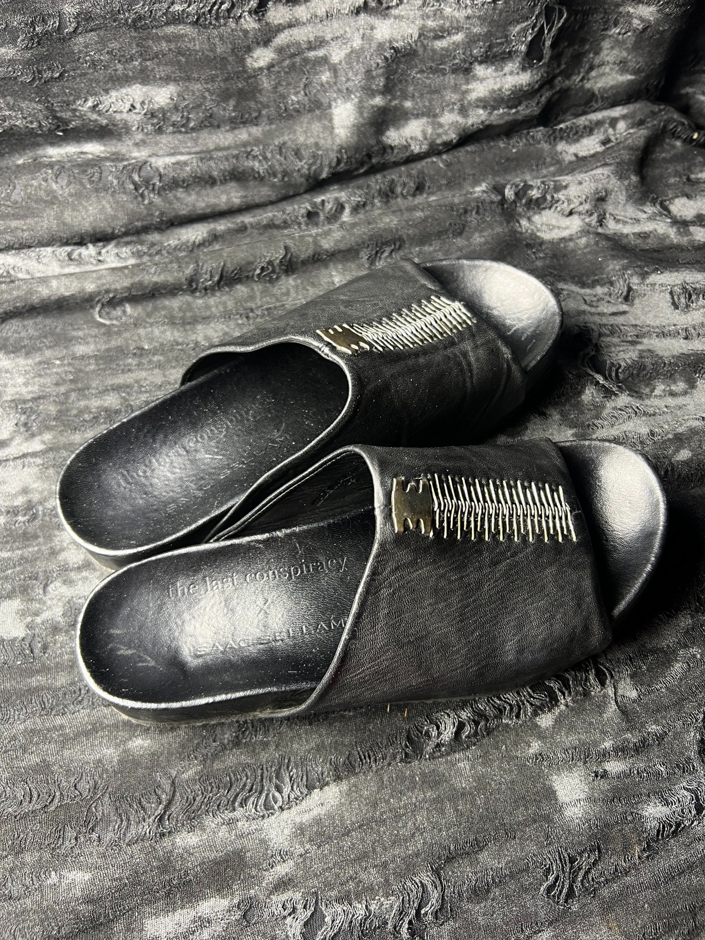 ISAAC SELLAM Black Leather Slippers — front