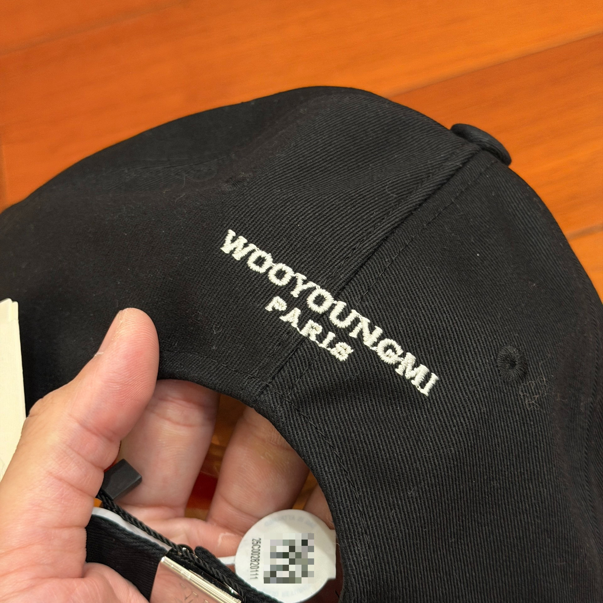 Wooyoungmi Navy Embroidered Baseball Cap — label