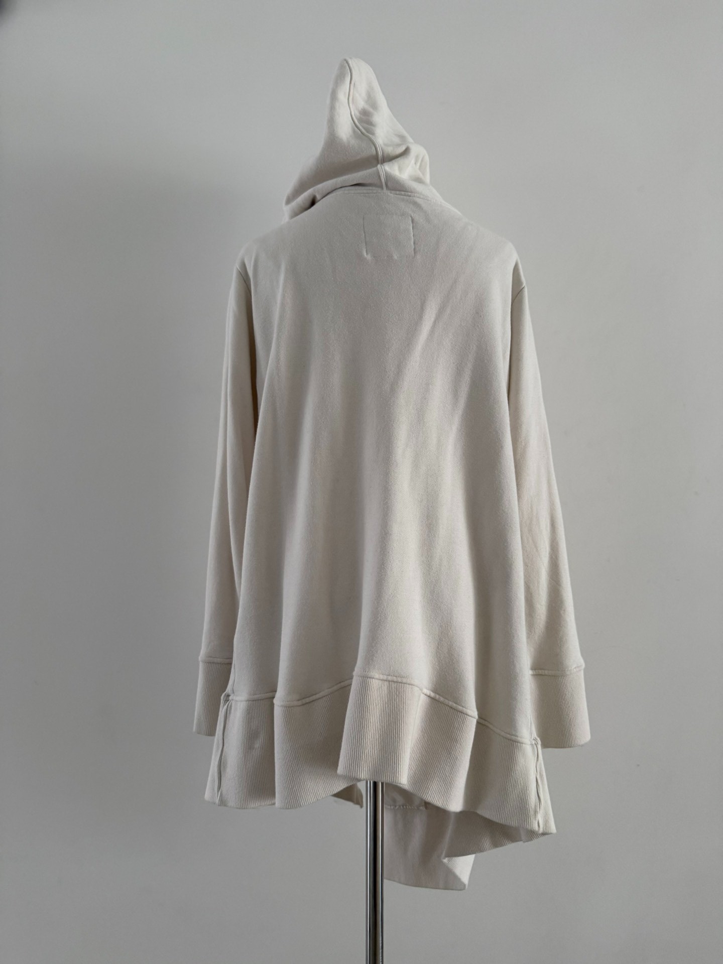 Undercover 04SS Asymmetric Hoodie — label