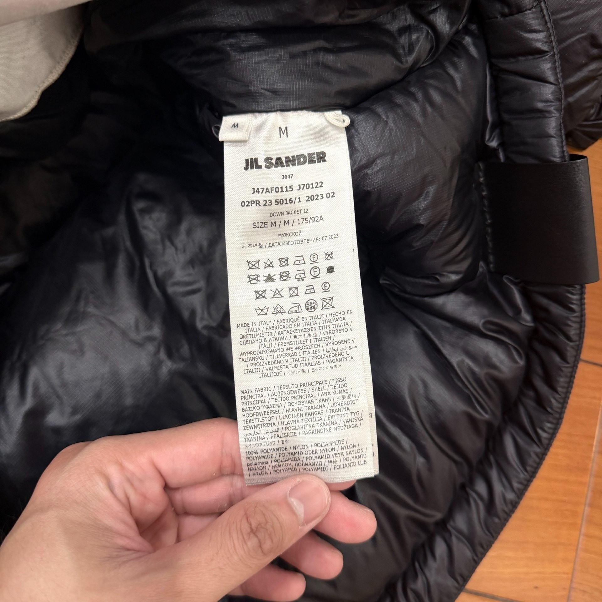 Jil Sander Black Down Puffer Jacket — label