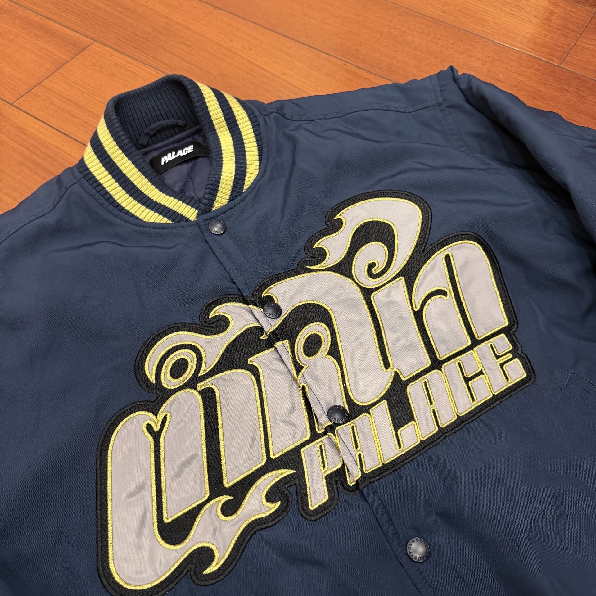 Palace FW25 Muay Navy Varsity Jacket — detail