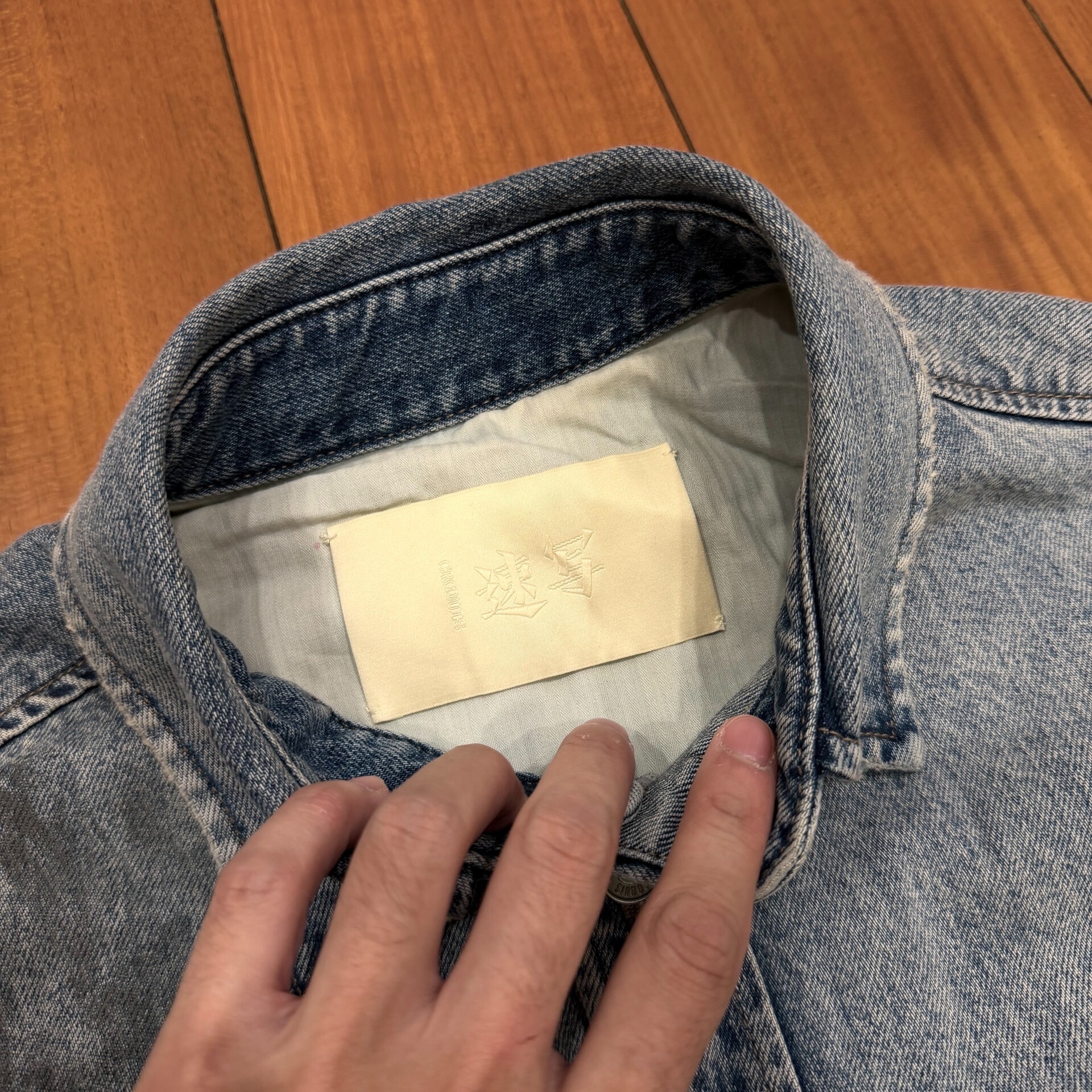 Distressed Light Blue Denim Shirt Jacket — label