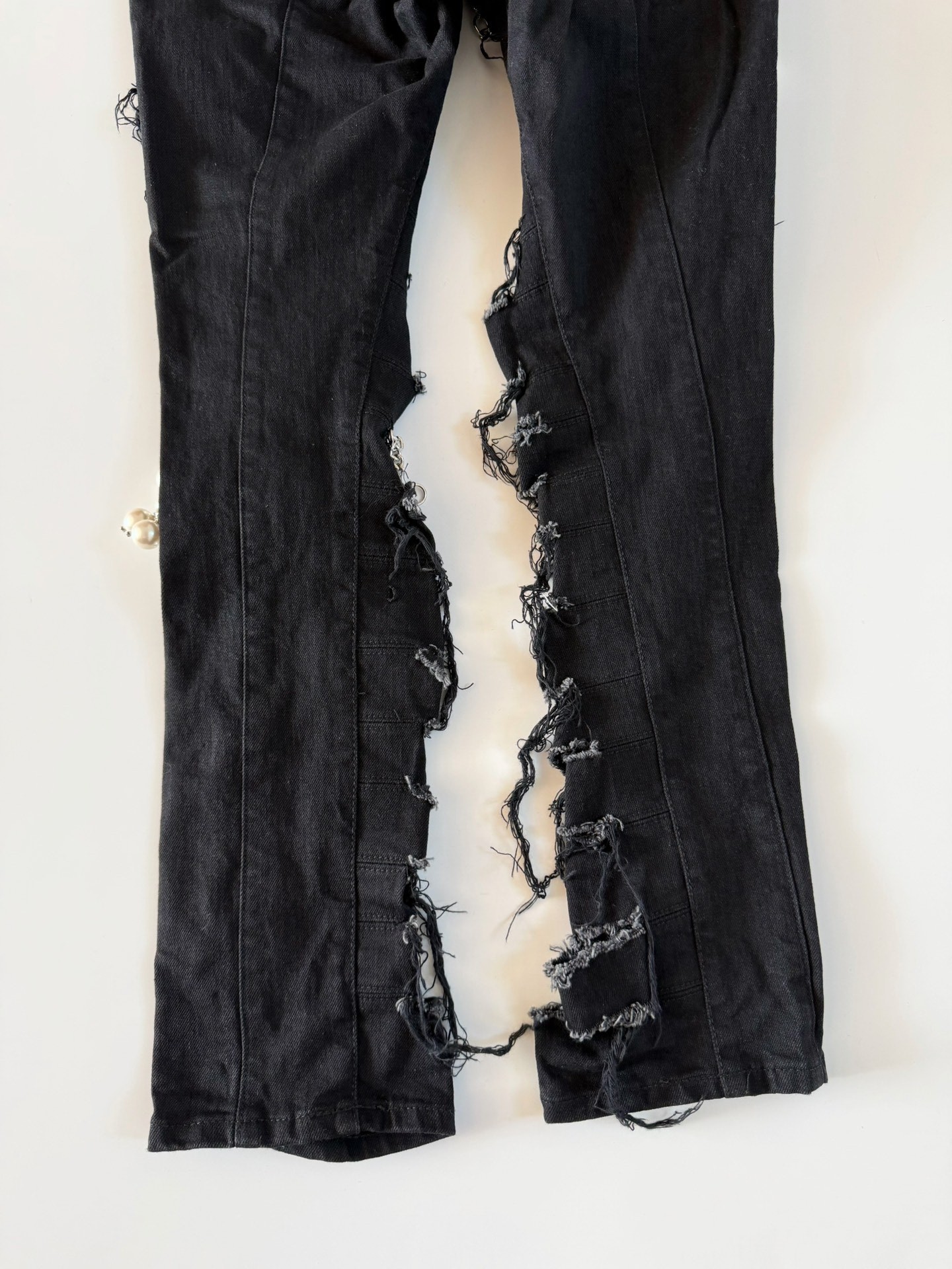 Junya Watanabe Distressed Beaded Jeans — label