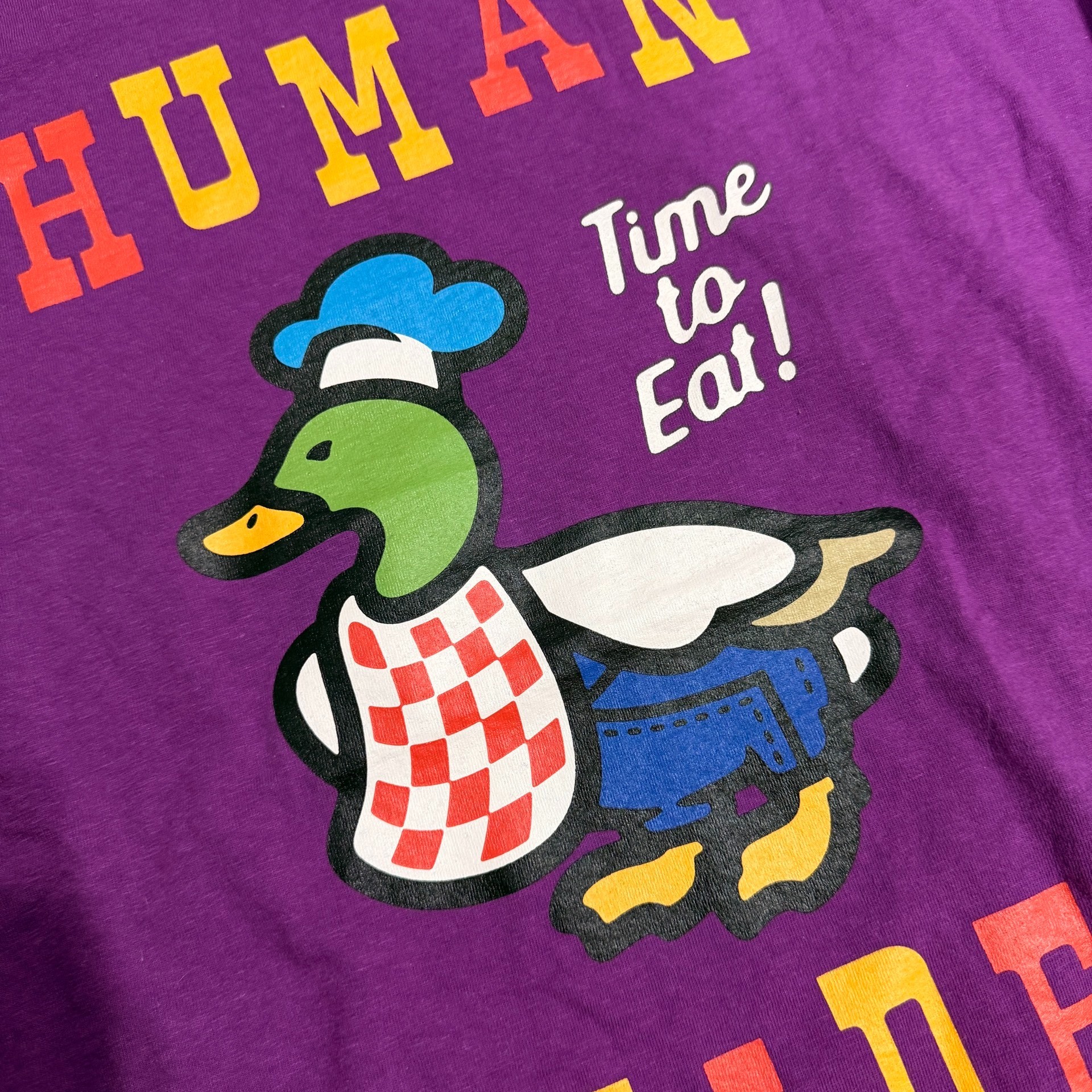 Human Made Purple Duck Graphic Sweatshirt — label