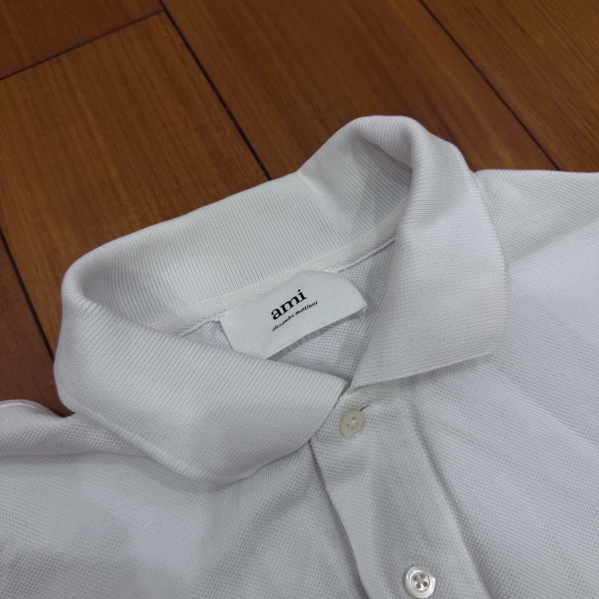 AMI Paris White Heart Logo Polo Shirt — back