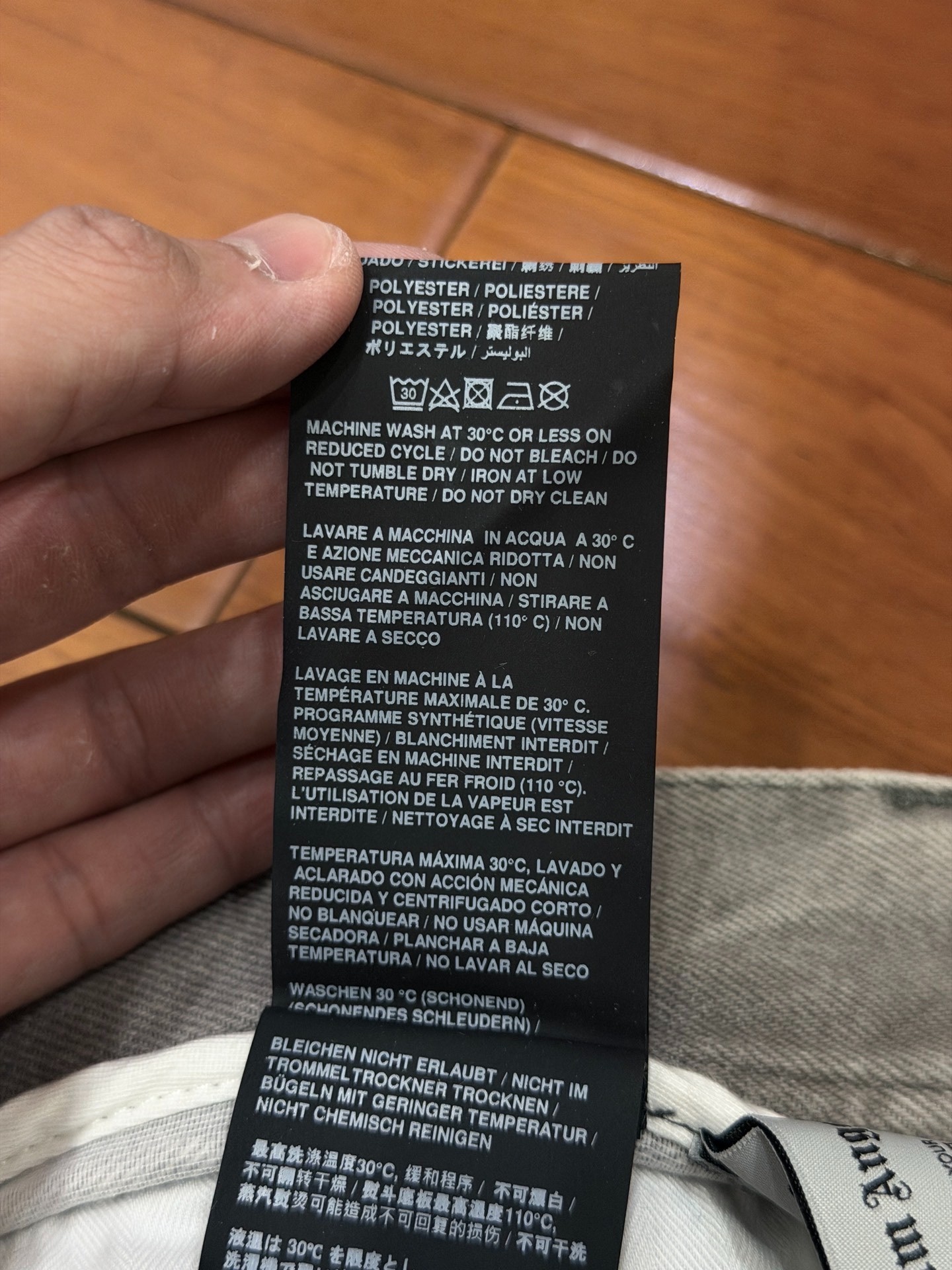 Palm Angels SS23 Faded Distressed Jeans — label