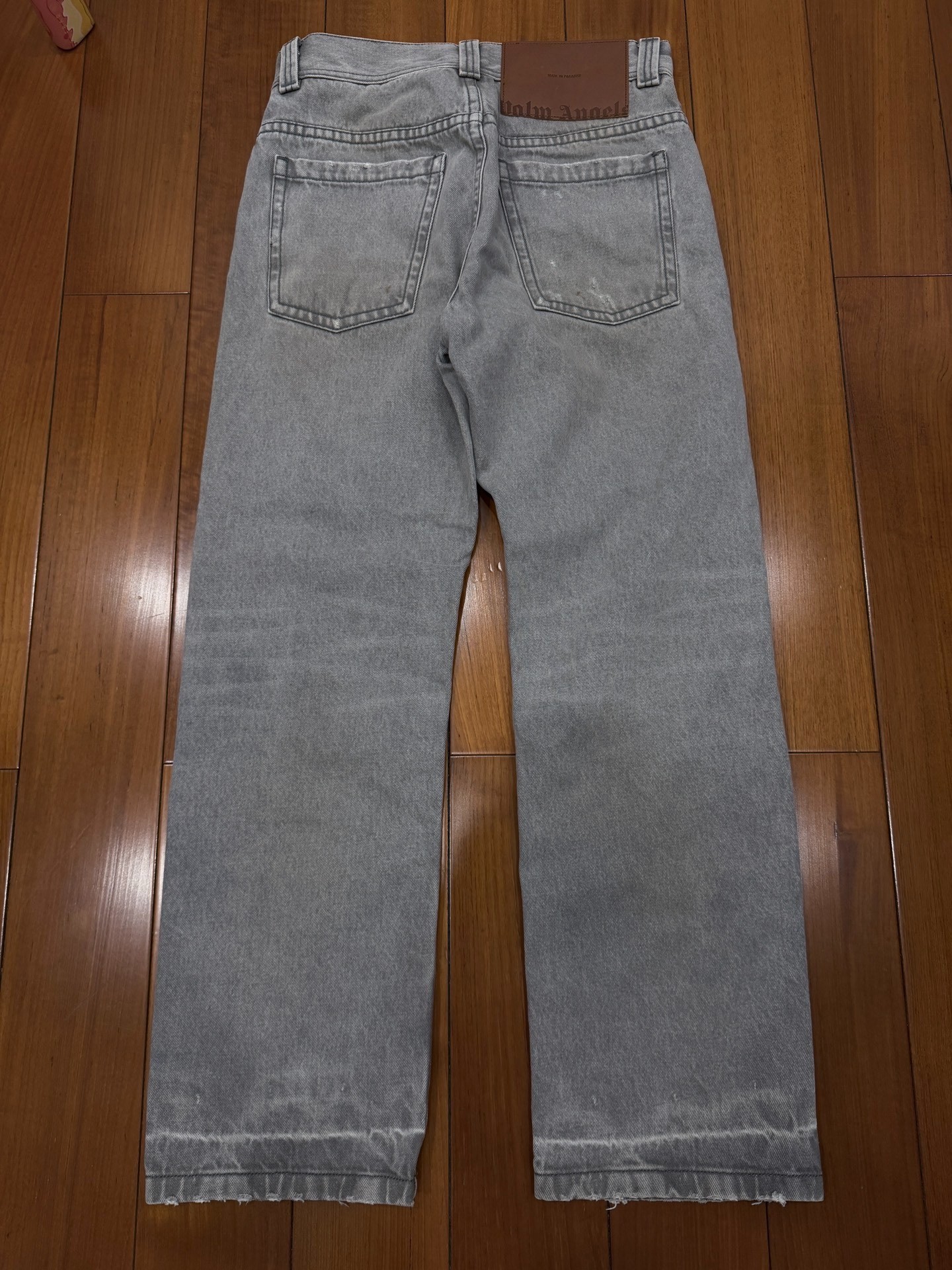 Palm Angels SS23 Faded Distressed Jeans — front