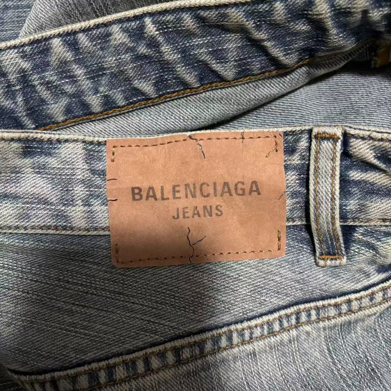 Balenciaga Distressed Wide-Leg Denim Jeans — detail