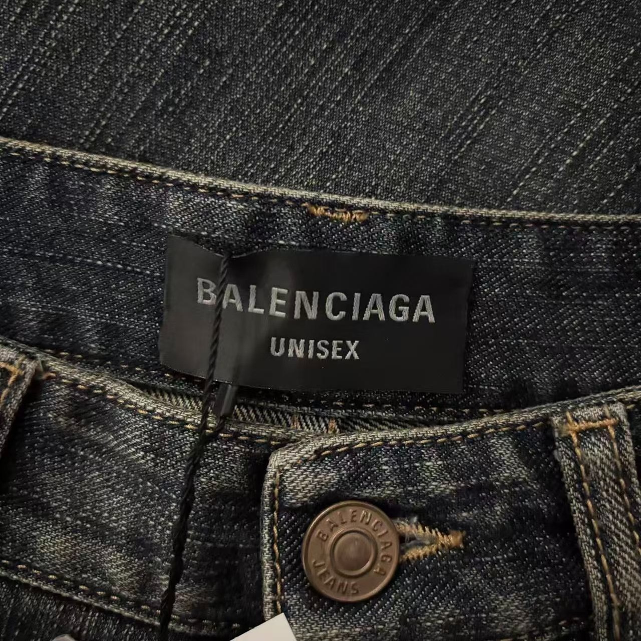 Balenciaga Mud-Wash Denim Shorts — detail