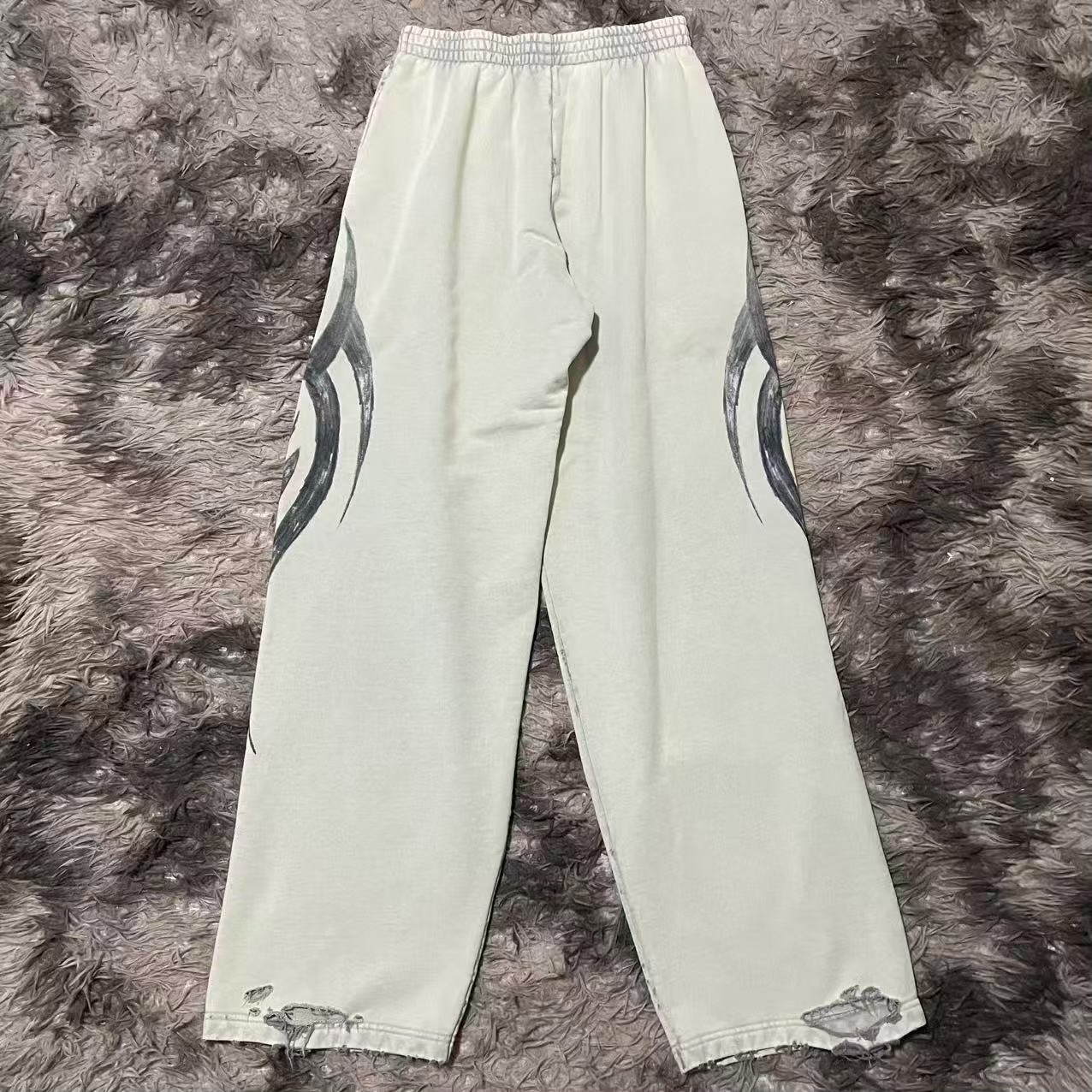 Balenciaga YK2 Baggy Dragon Thorn Sweatpants — front
