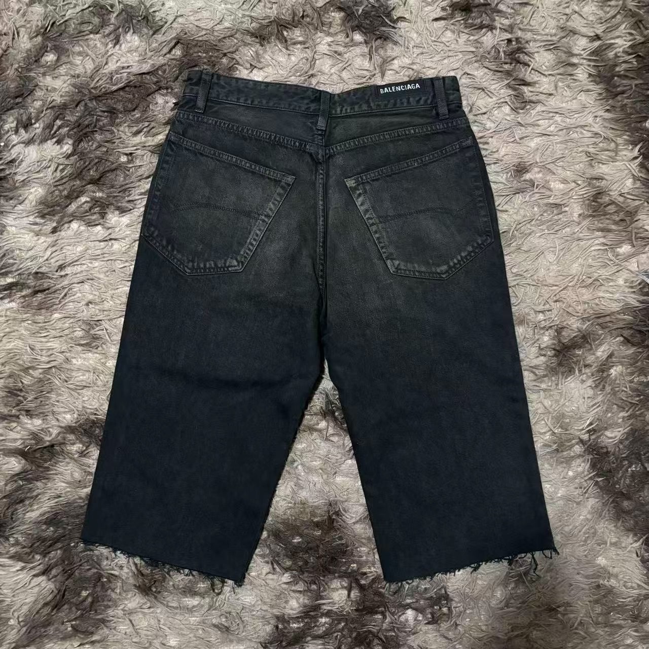 Balenciaga Black Distressed Denim Shorts — front
