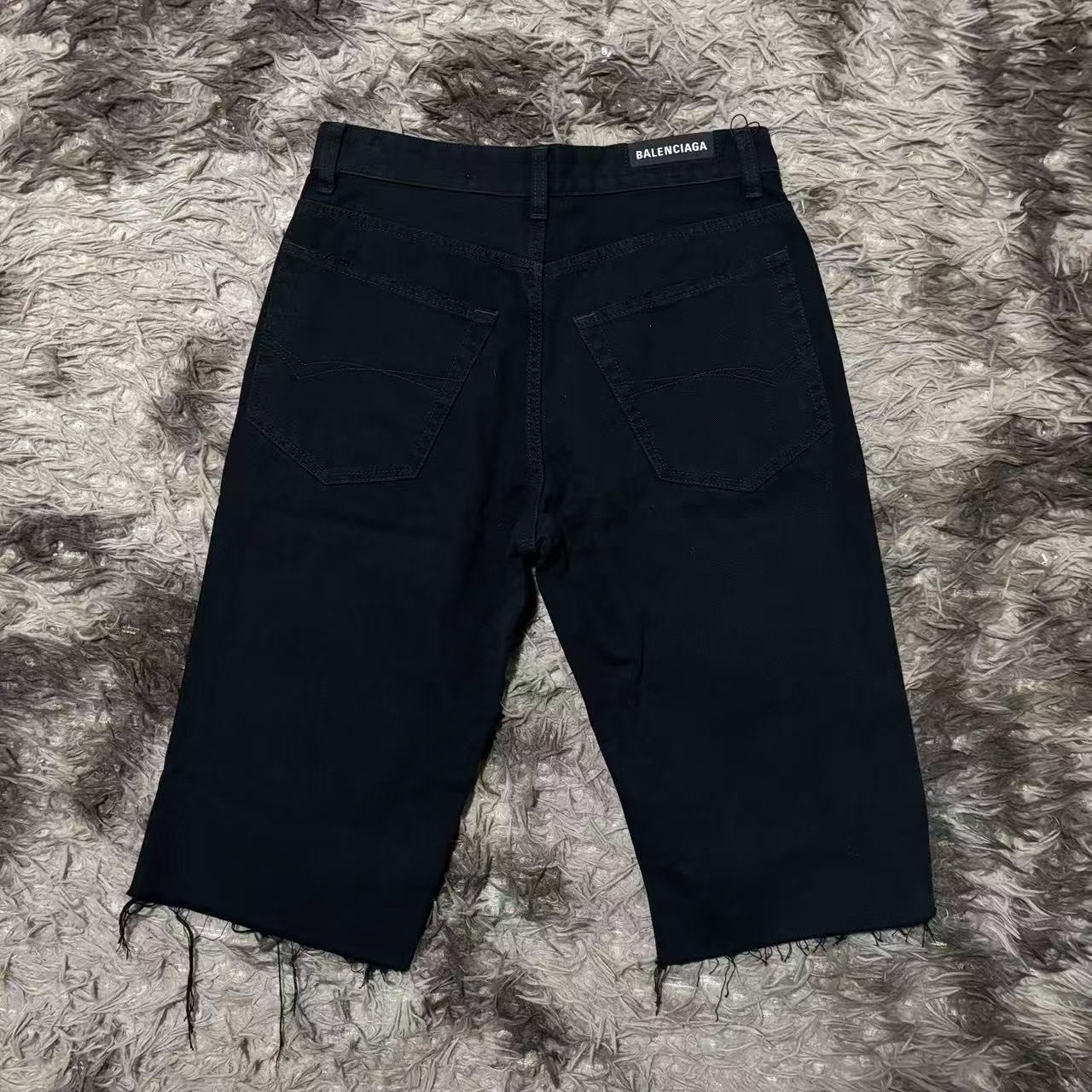 Balenciaga Black Frayed Denim Shorts — front