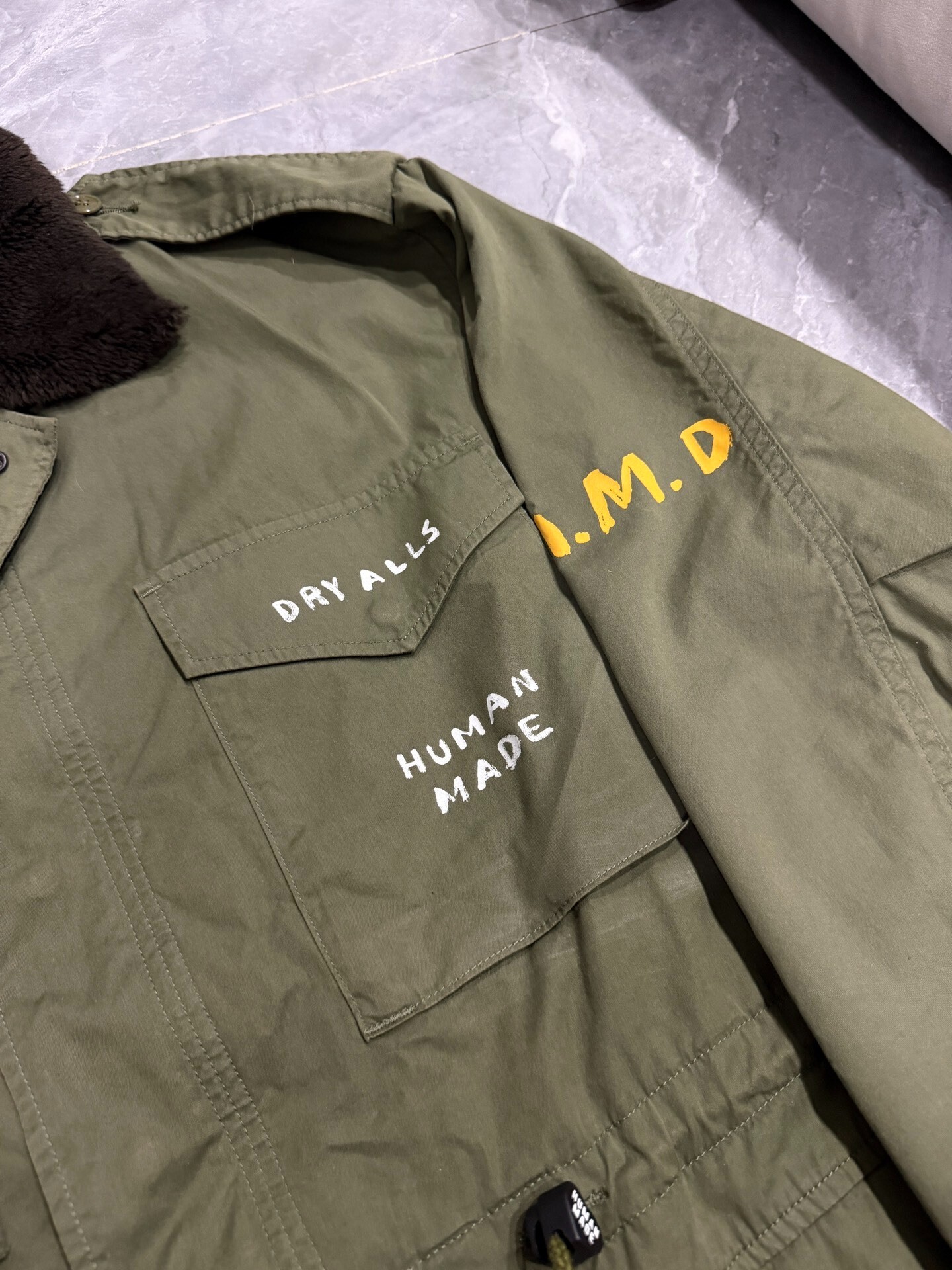 Human Made FW24 Olive Military Jacket — label