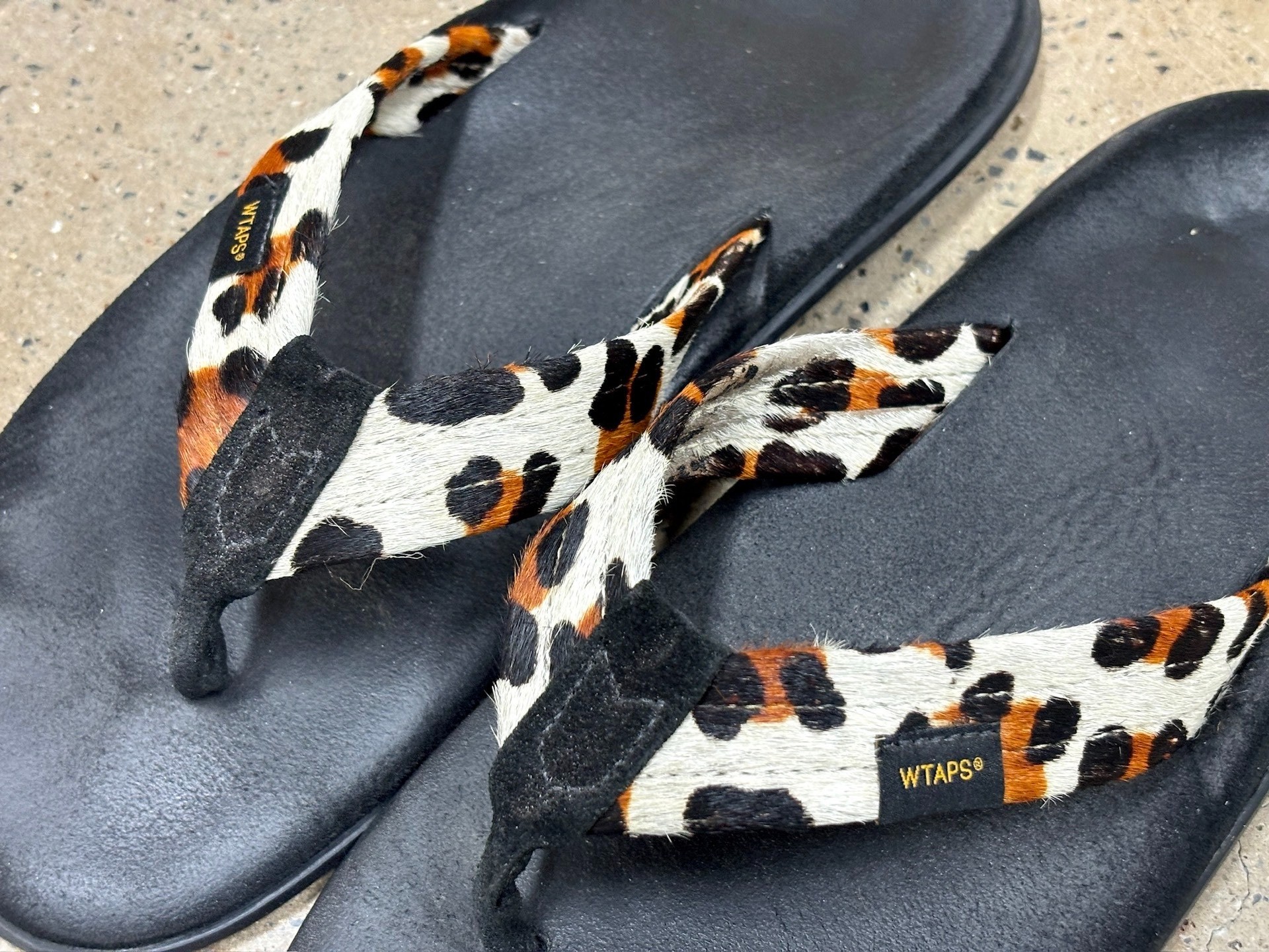 WTAPS x Island Pro Leather Flip Flops — label