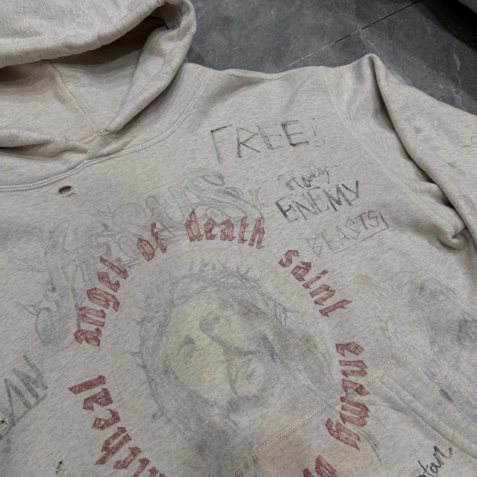 Saint Michael Distressed Graffiti Hoodie — detail