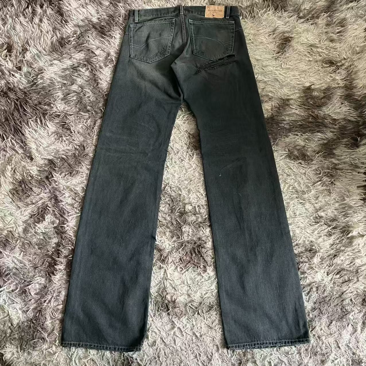 Balenciaga Low-Rise Ripped Straight Jeans — front