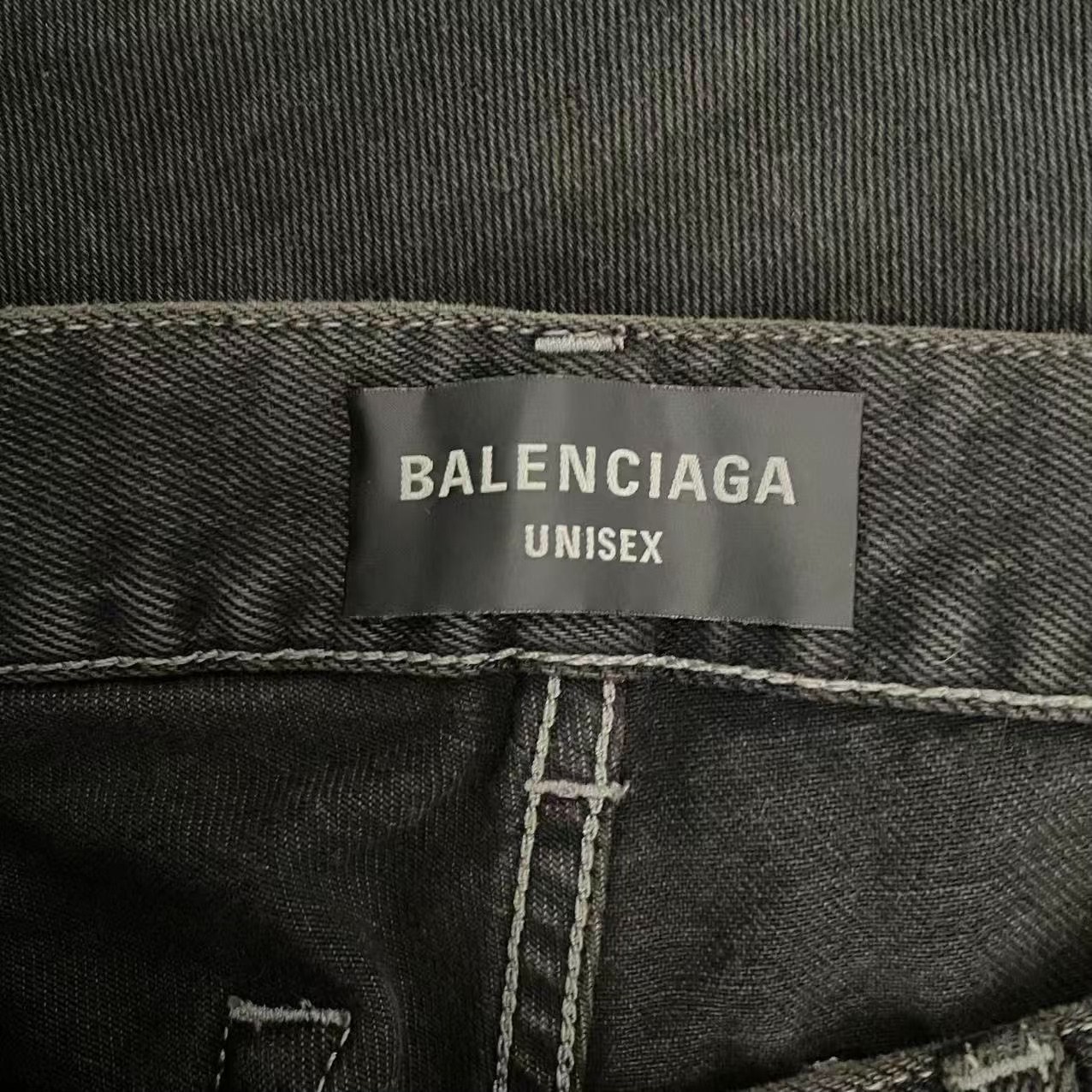 Balenciaga Low-Rise Ripped Straight Jeans — detail