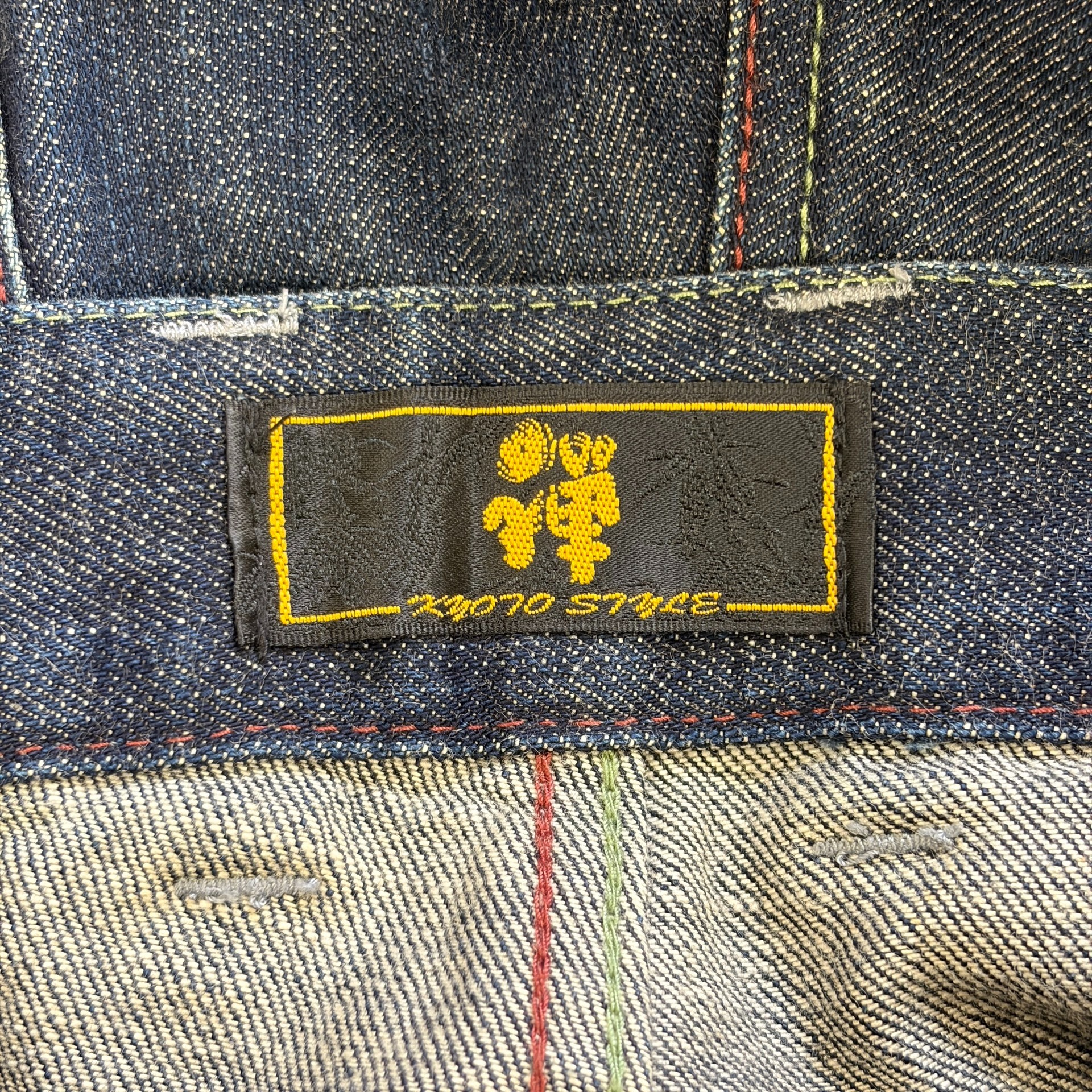 Kyoto Yuzen Hand-Painted Cherry Denim Jeans — label