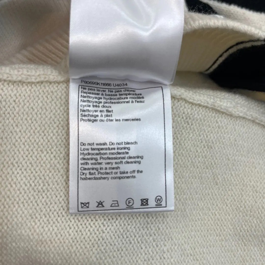 Chanel 25K White Black Bow Cardigan — label