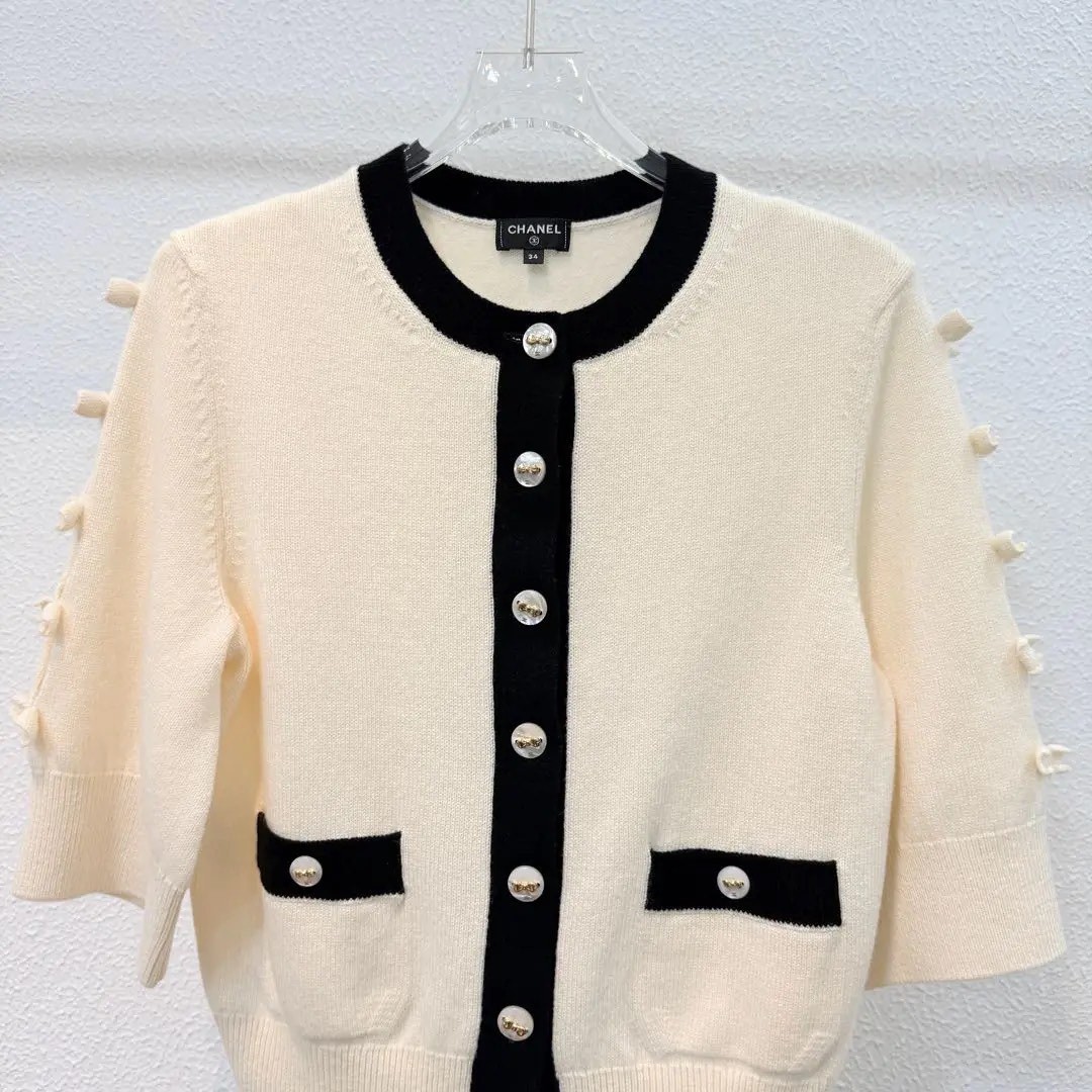 Chanel 25K White Black Bow Cardigan — front