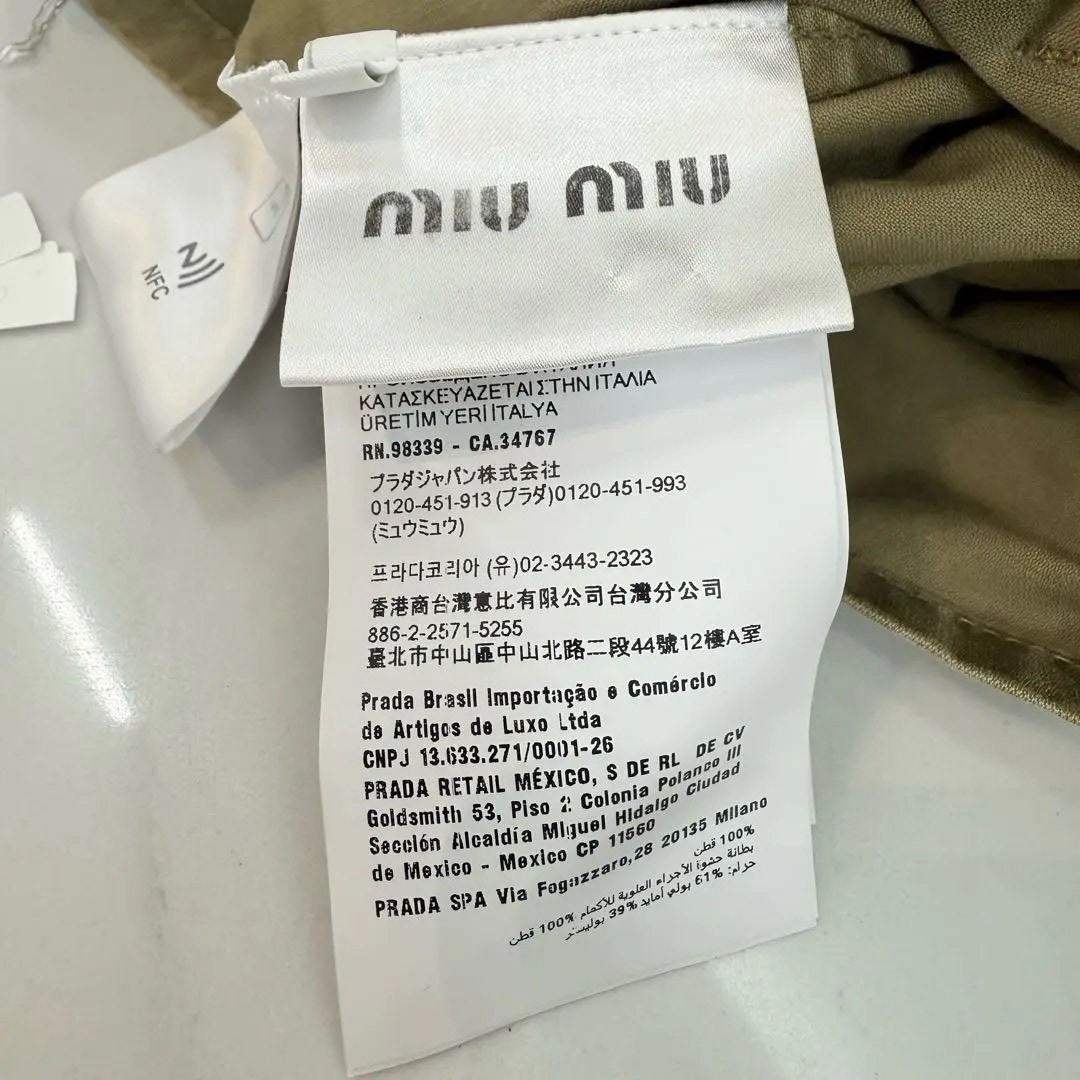 Miu Miu Khaki Green Utility Sleeveless Dress — label