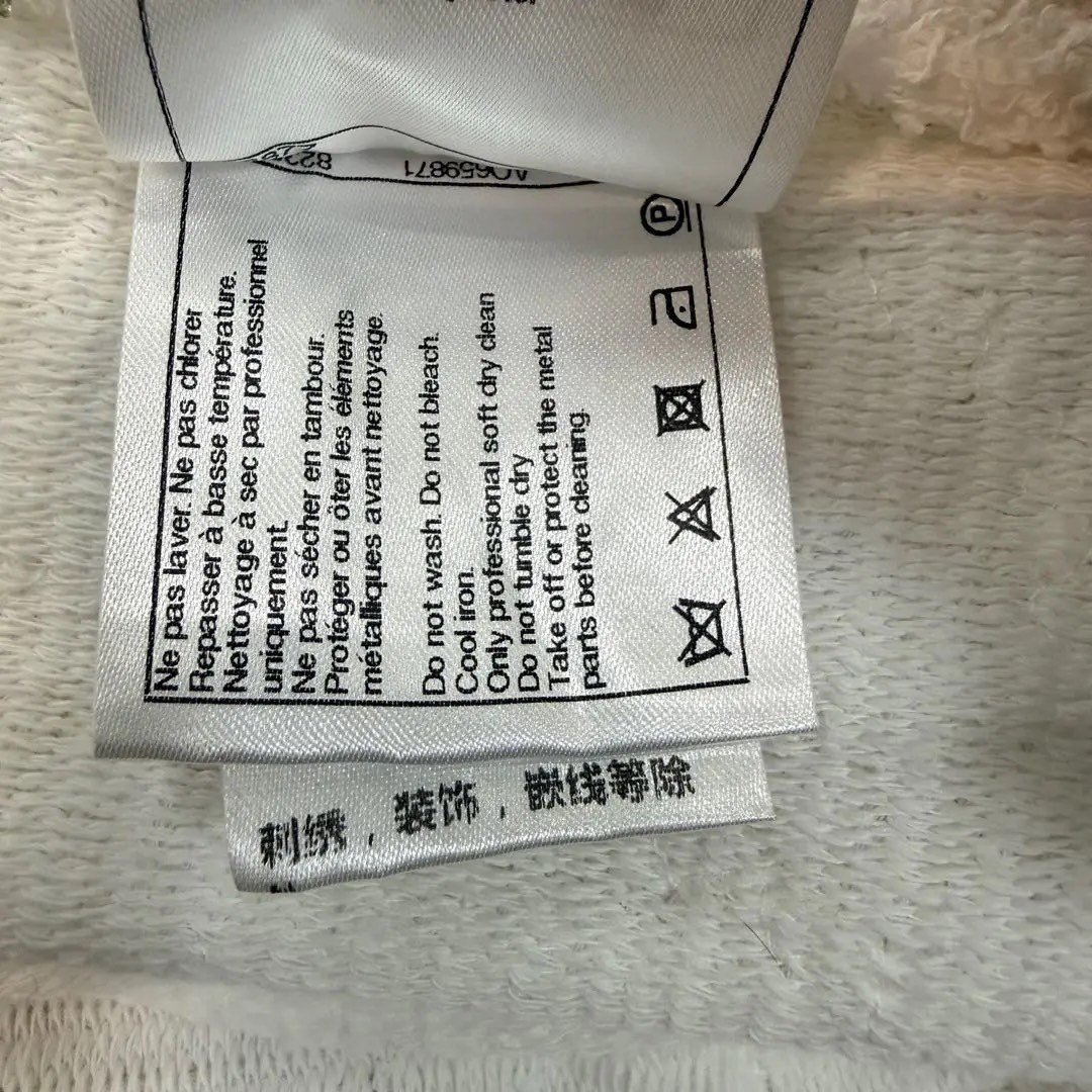 Chanel Long Silver-Thread Tweed Coat — label