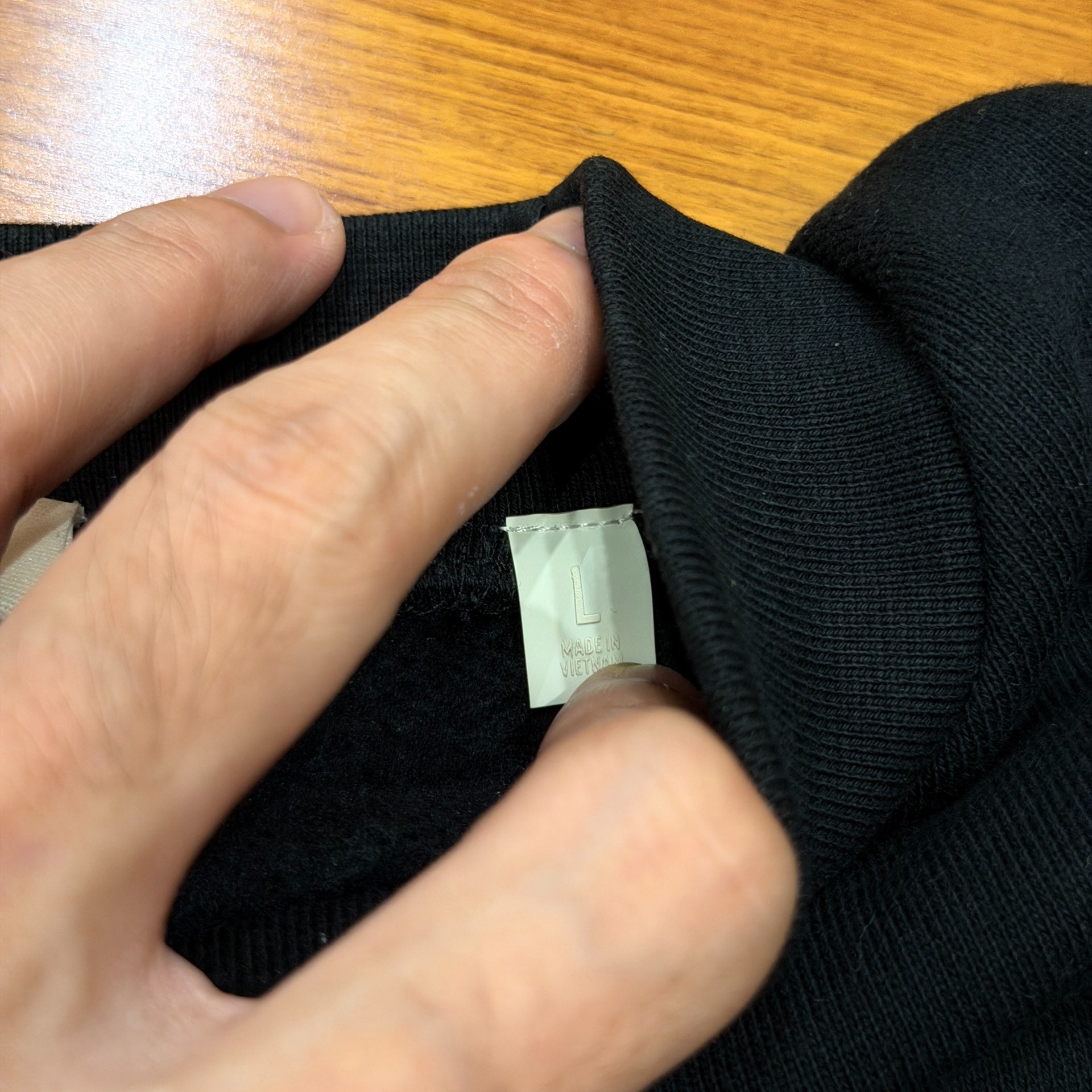 Fear of God Essentials Round-Neck Sweatshirt — label