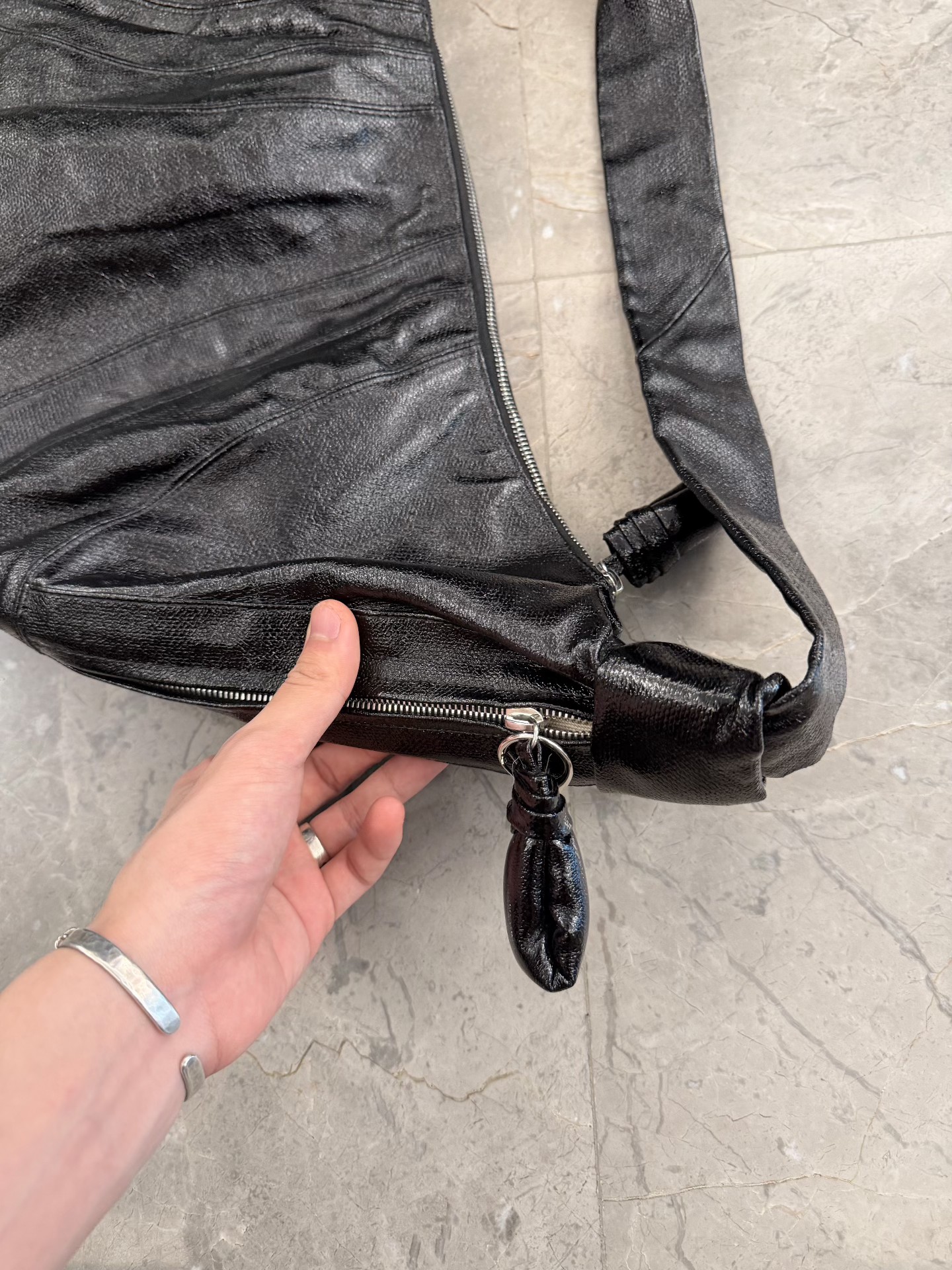 Lemaire Black Waxed Leather Crescent Bag — detail