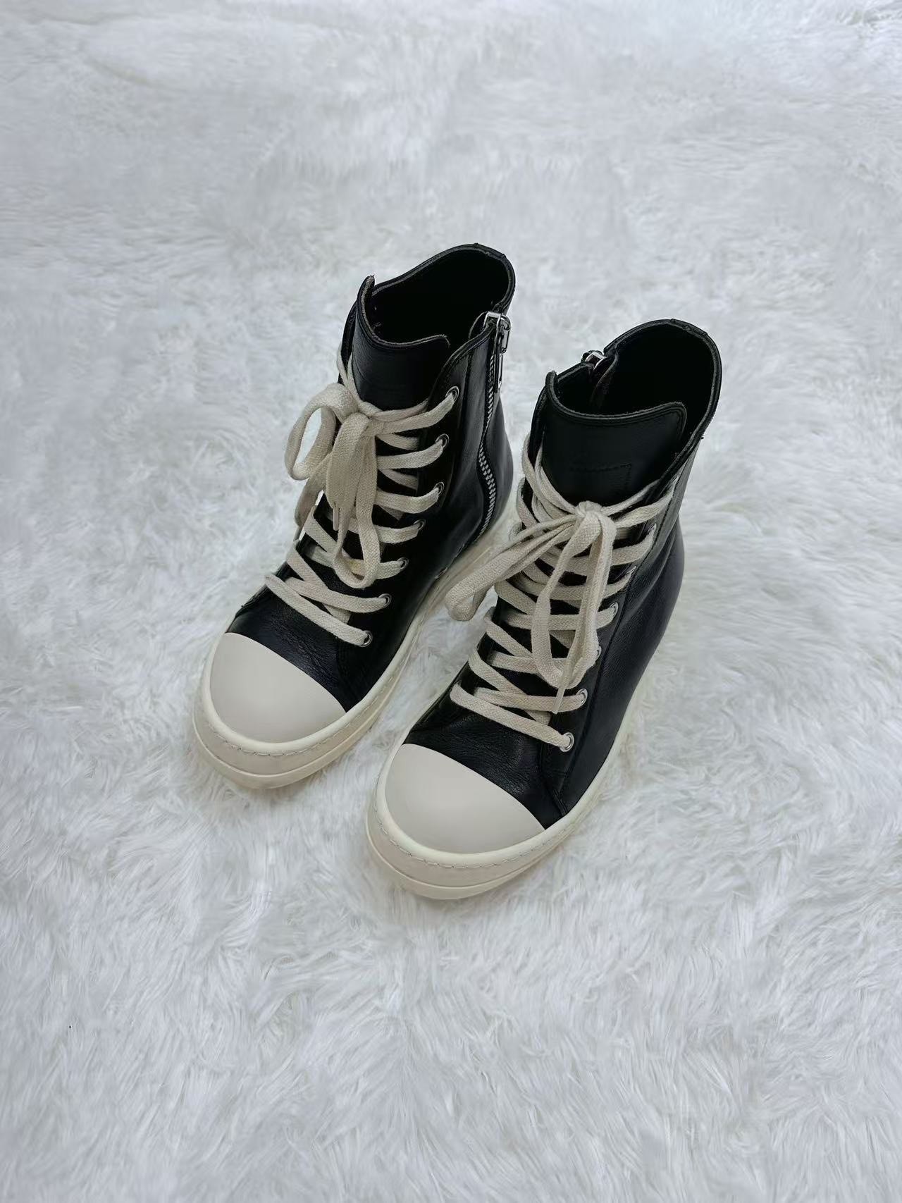 Rick Owens Black High-Top Leather Sneakers — front