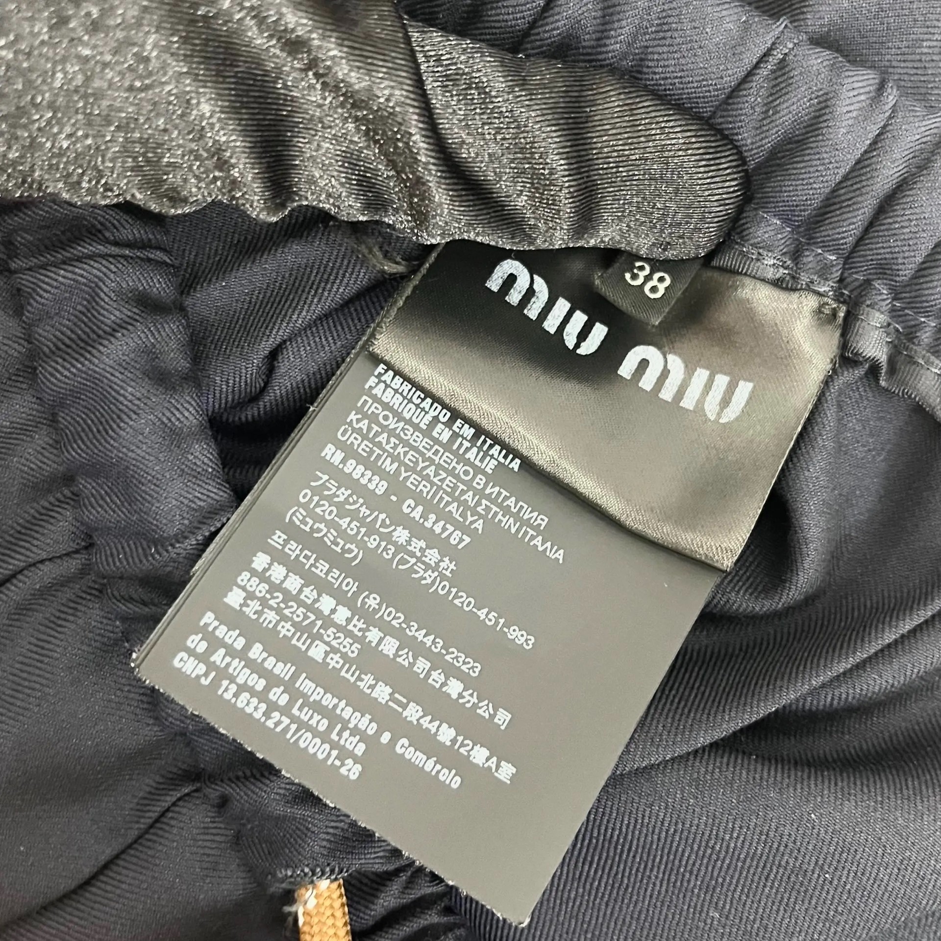 MiuMiu Black Pleated Mini Skirt With Drawstring — label