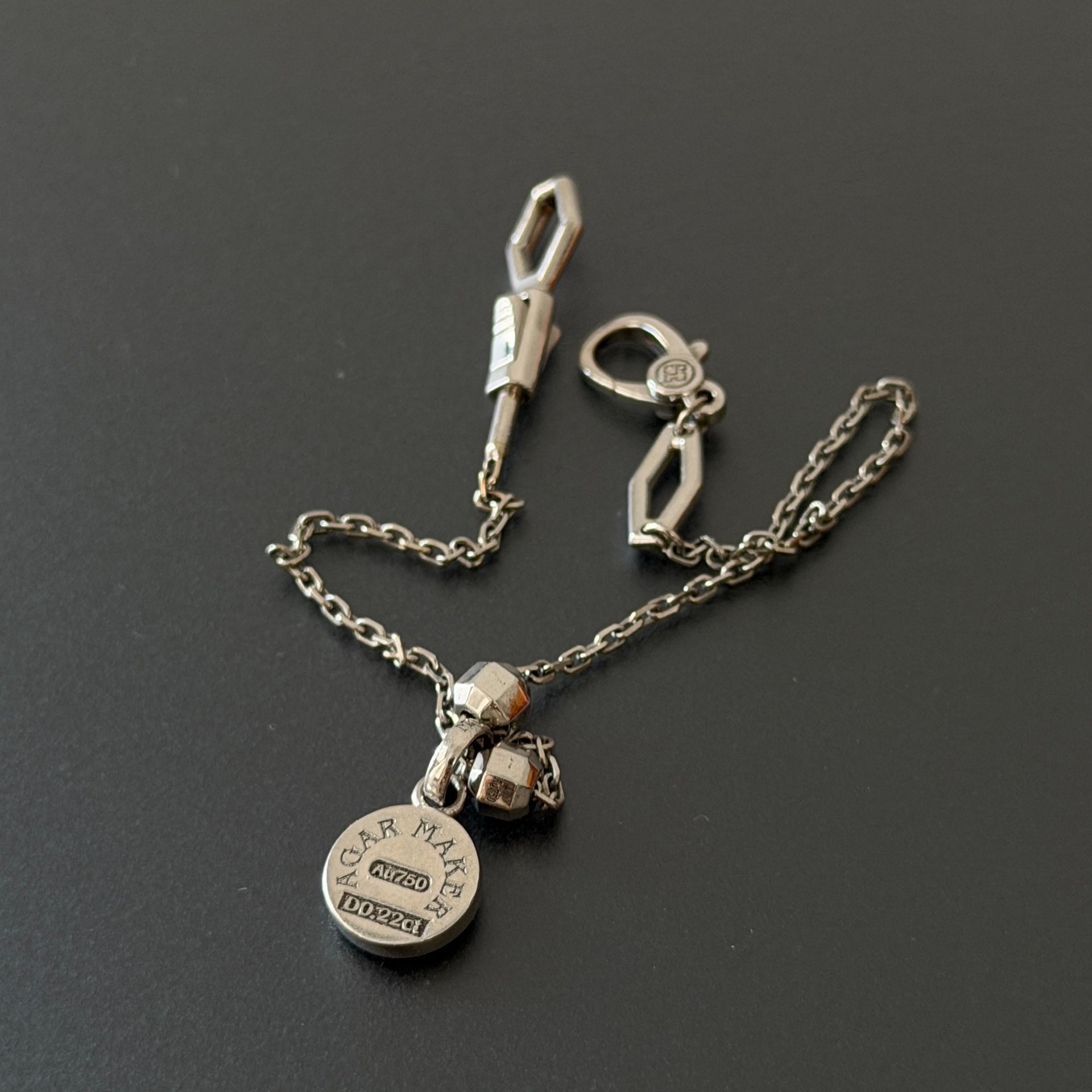 Agar Maker Lightning Tag Bracelet Keychain — front