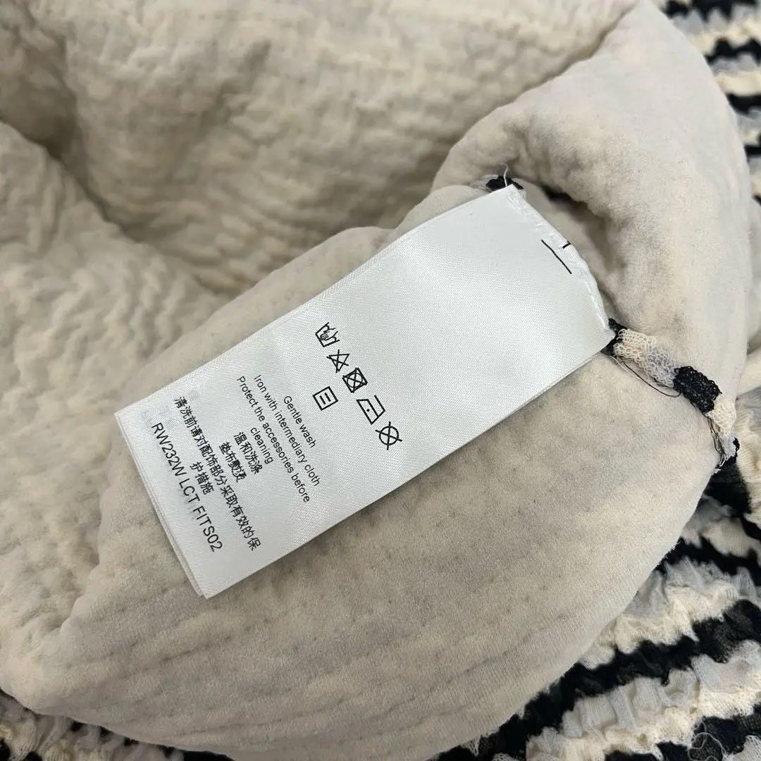 LV Crinkled Striped Long Sleeve Top — label