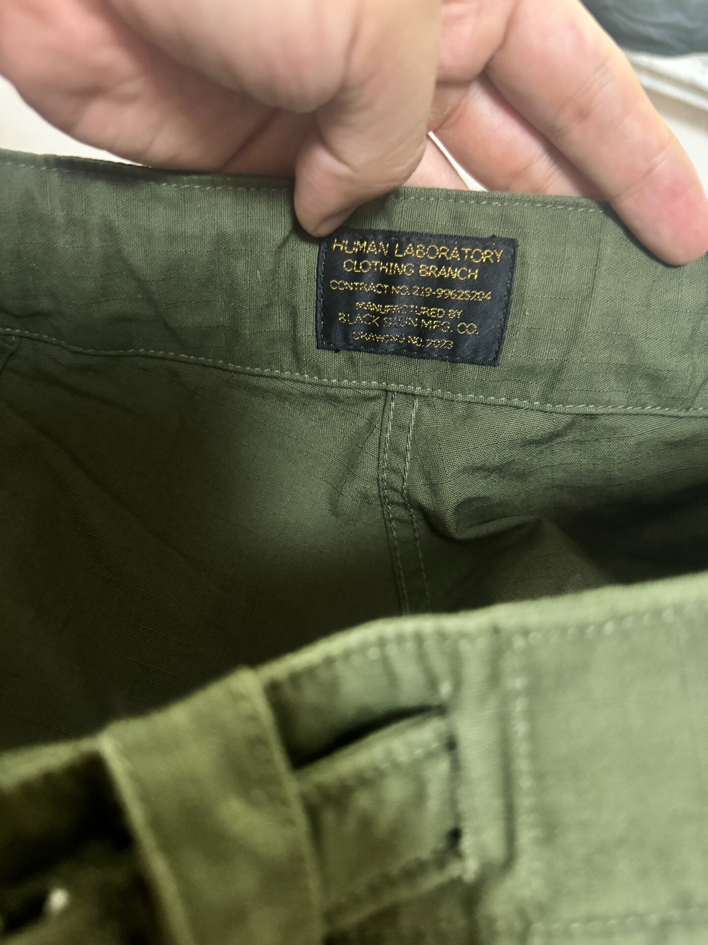 Blacksign Green High-Waisted Utility Shorts — label