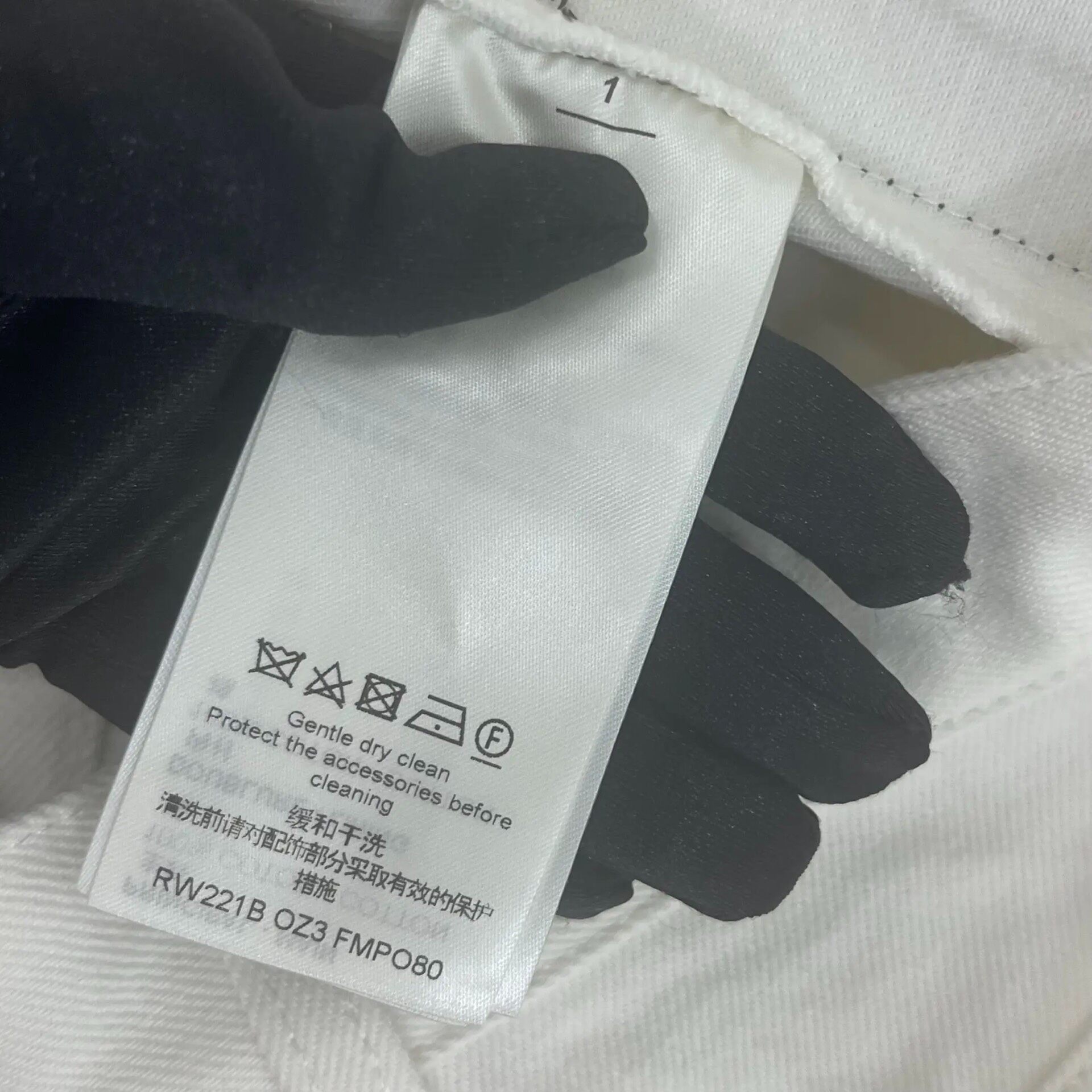 LV Monogram High-Waisted Denim Shorts — label