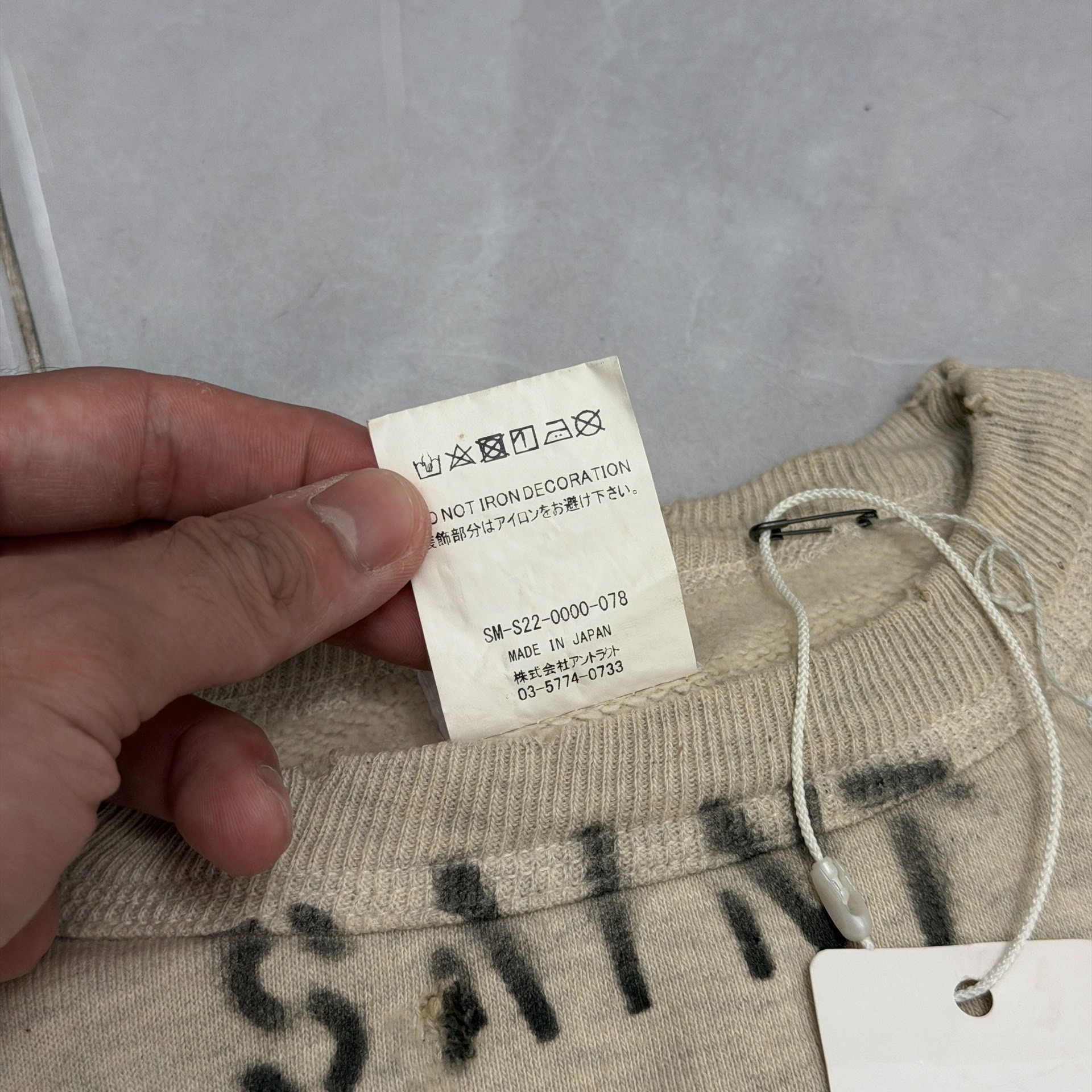 Saint Michael Comic Hooded Sweatshirt — label