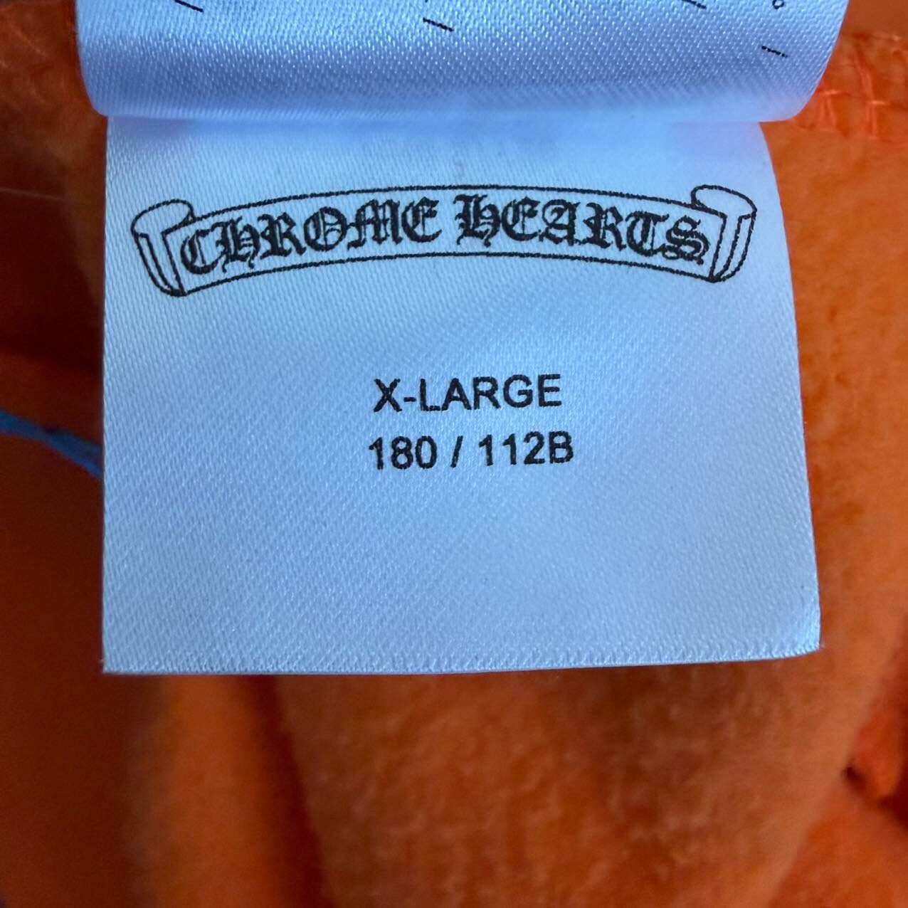 Chrome Hearts Orange Printed Hoodie — label