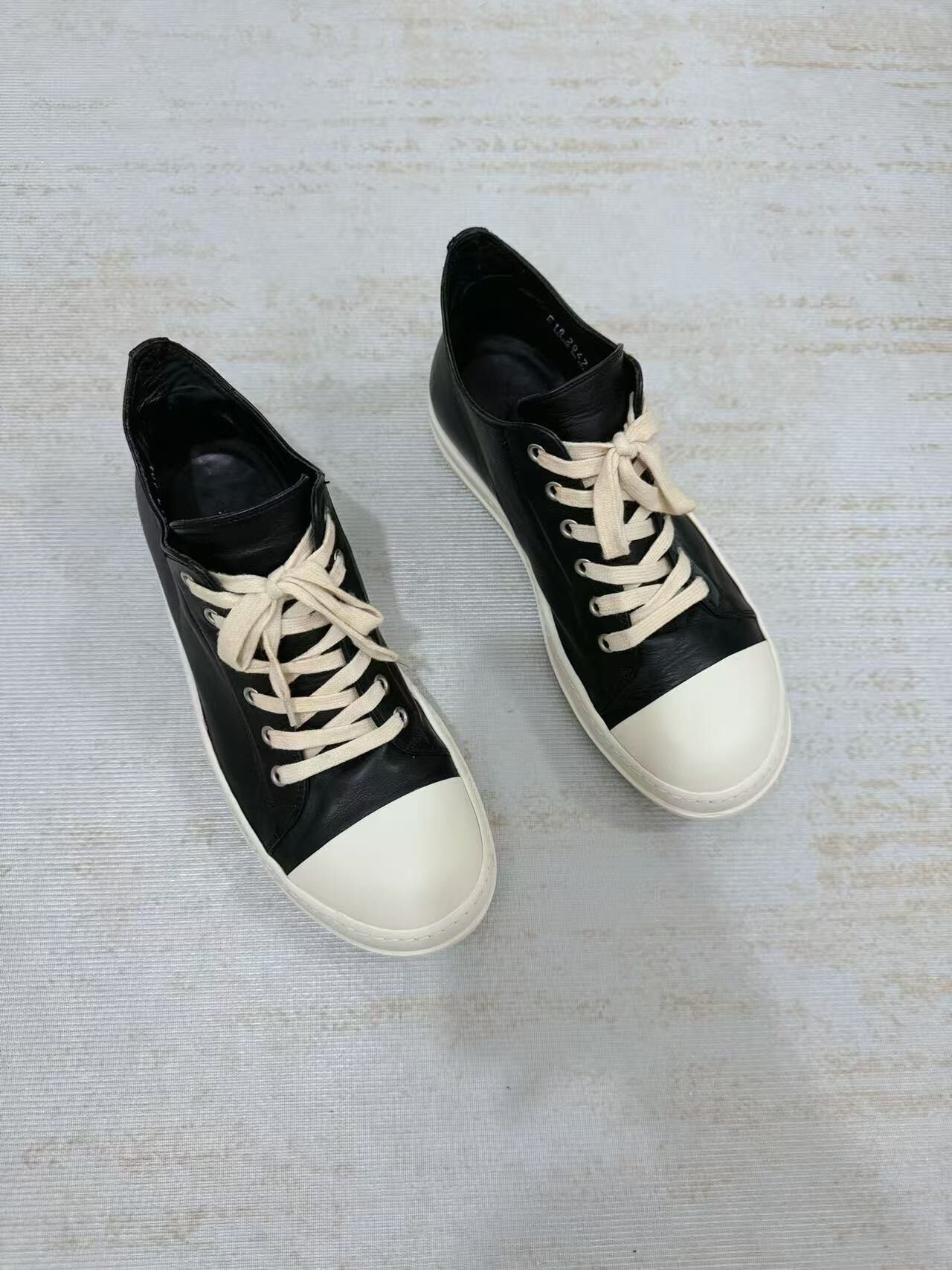 Rick Owens Black High-Top Leather Sneakers — detail