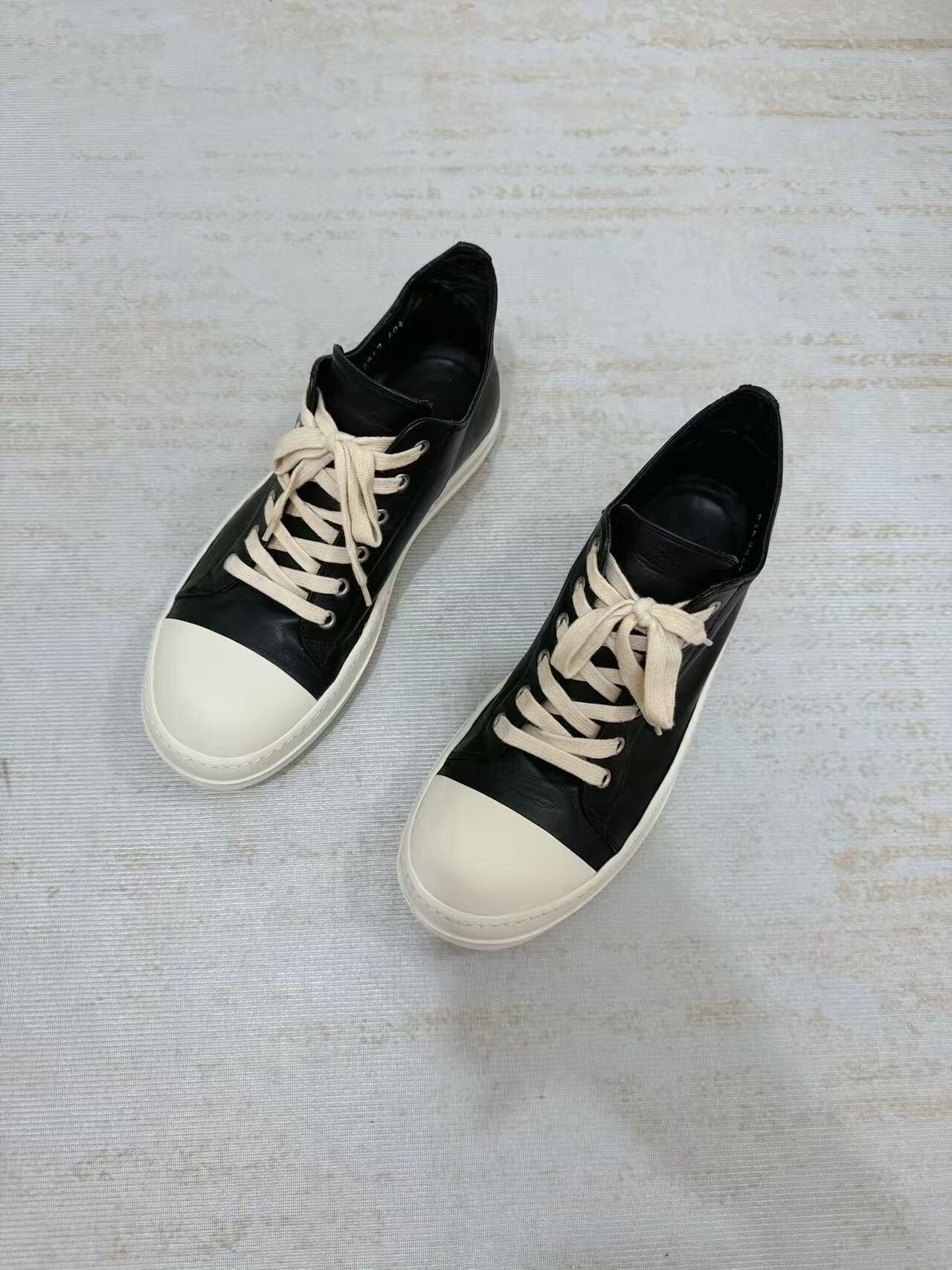 Rick Owens Black High-Top Leather Sneakers — front
