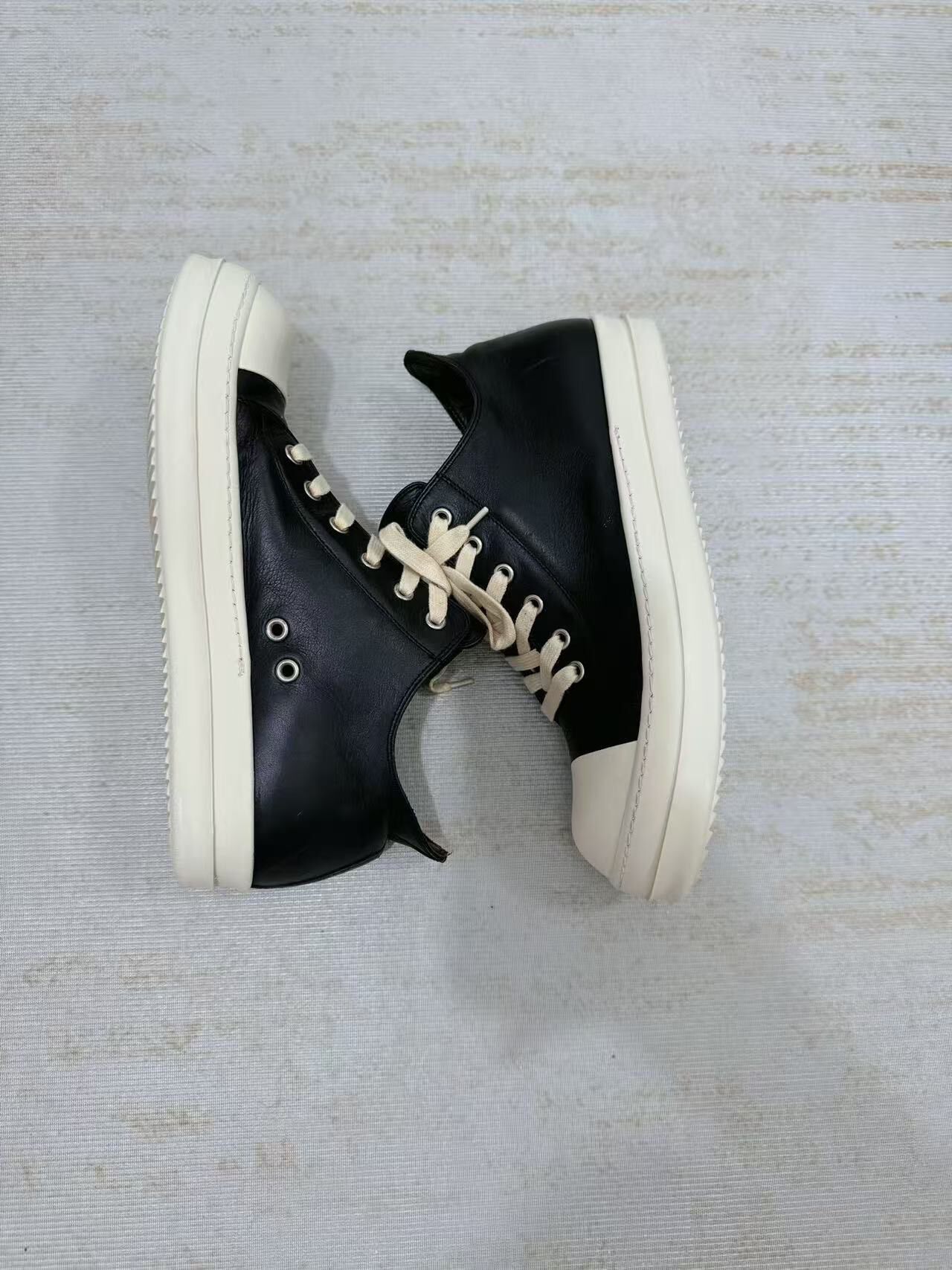 Rick Owens Black High-Top Leather Sneakers — label