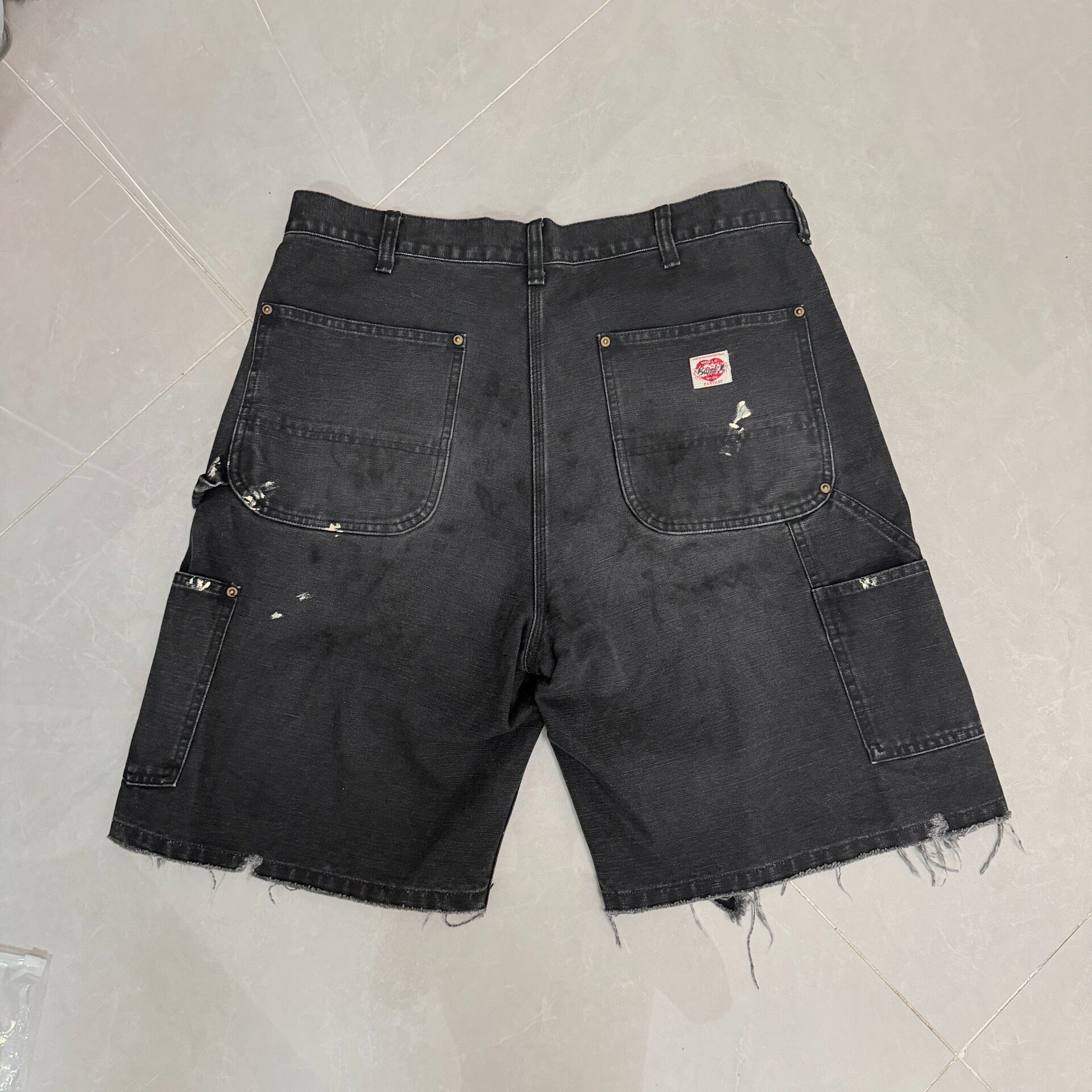 Saint Michael SS25 Distressed Denim Shorts — front
