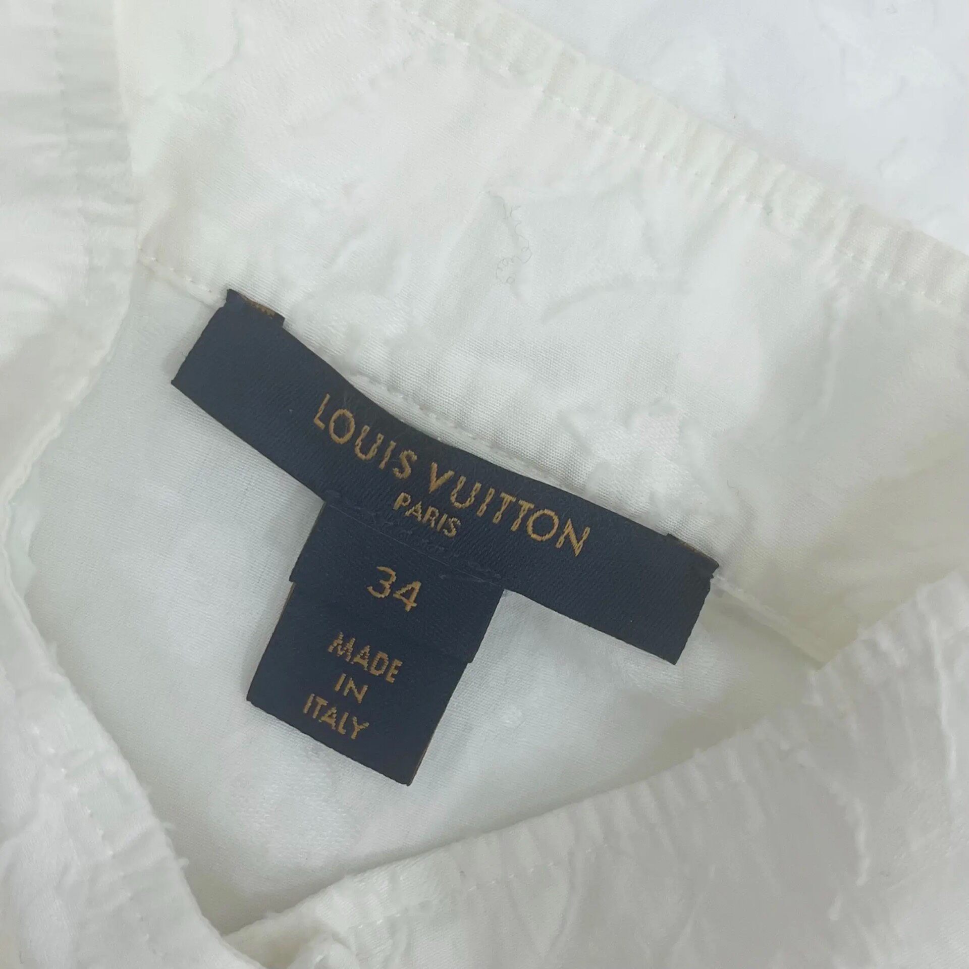 Louis Vuitton White Ruffled Short Sleeve Top — back