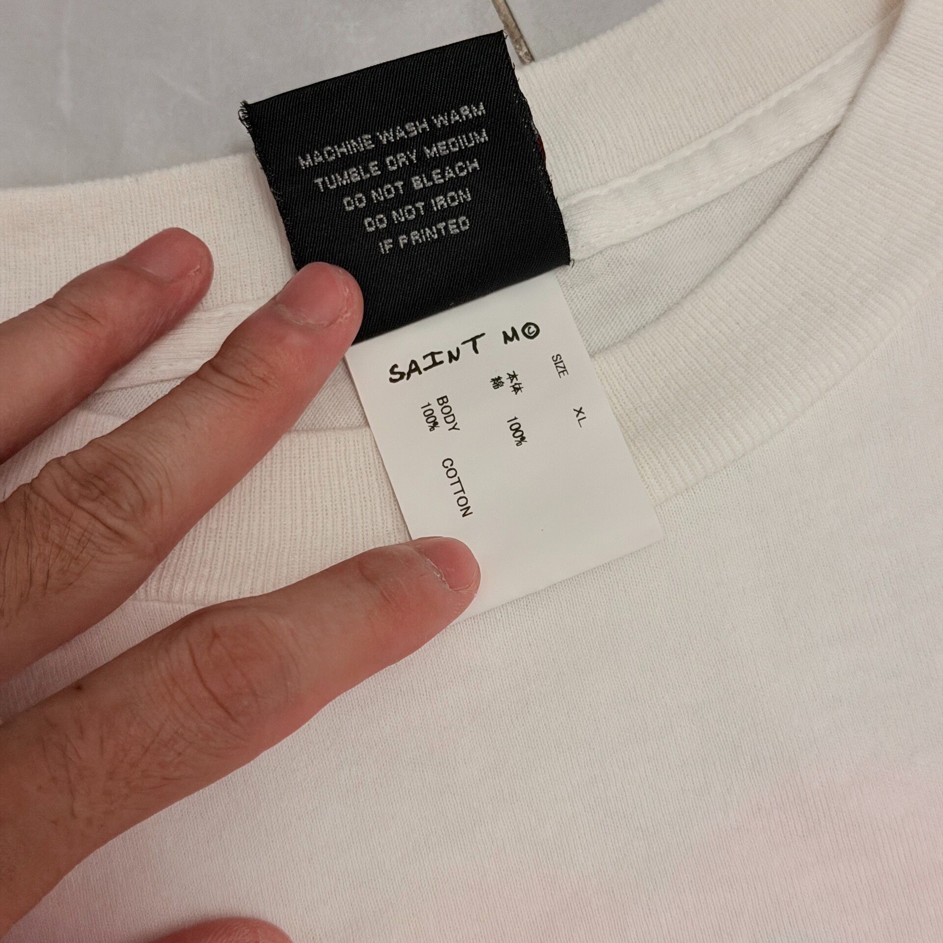 Saint Michael Heart White Short Sleeve Tee — label