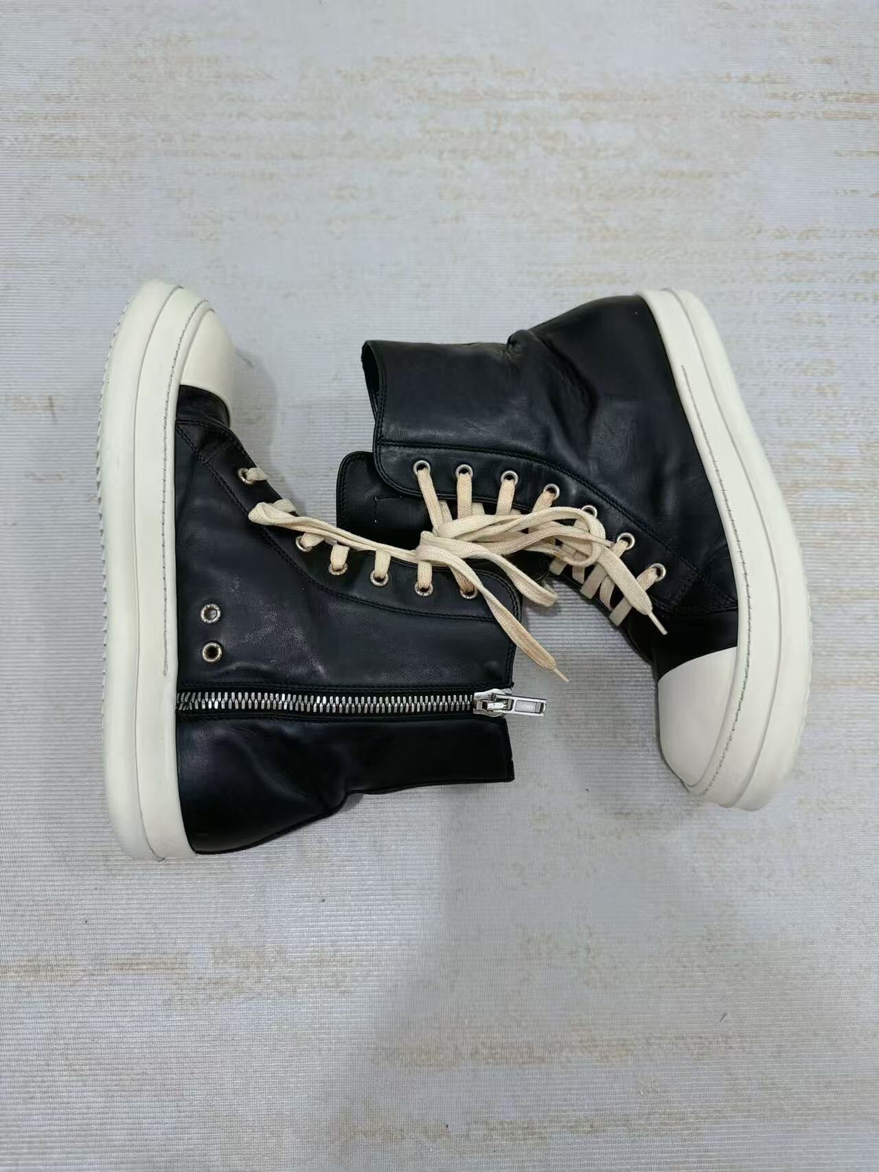Rick Owens Leather High-Top Sneakers — label